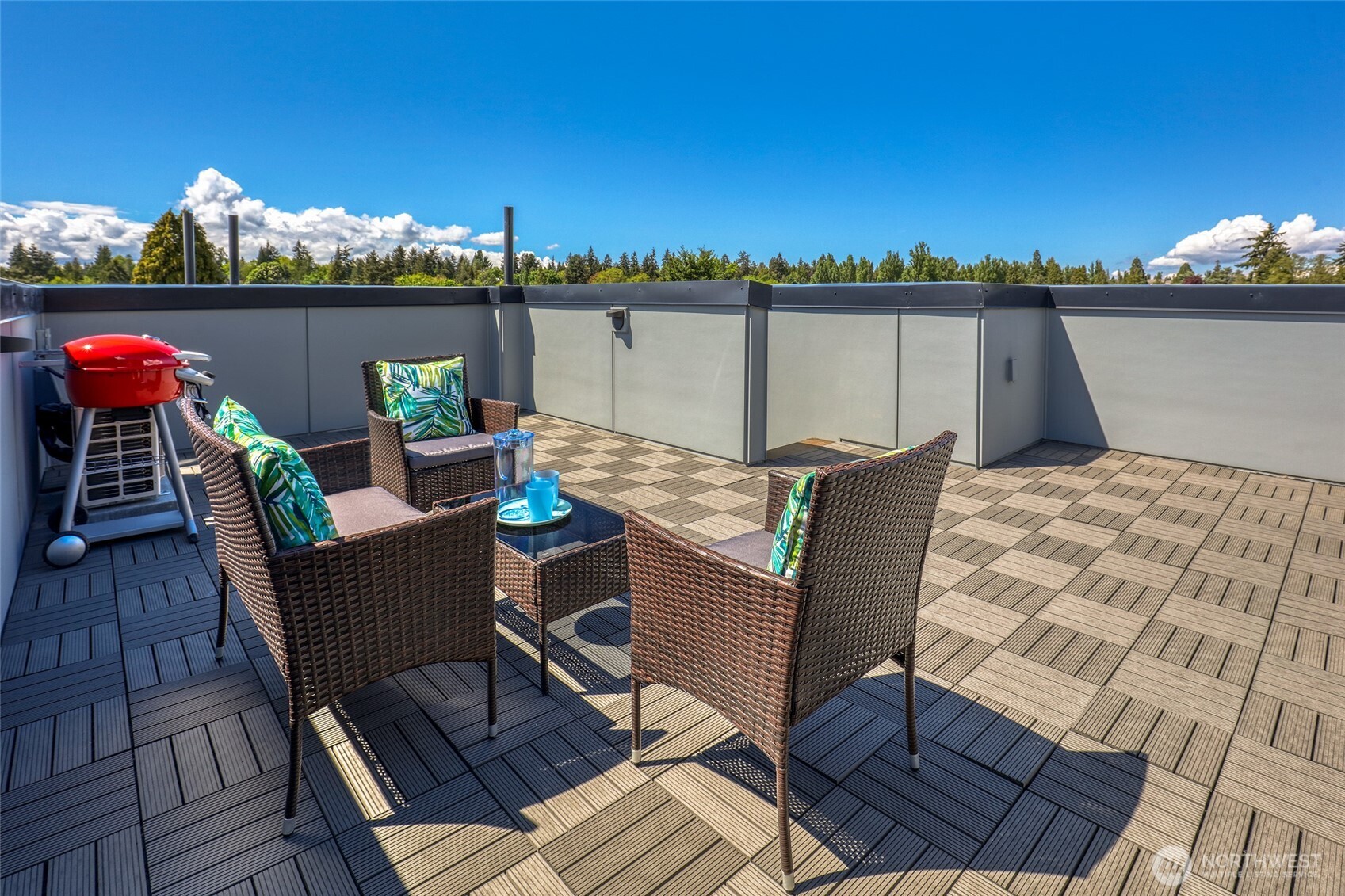 Private rooftop deck, BBQ ready, sweeping territorial views.