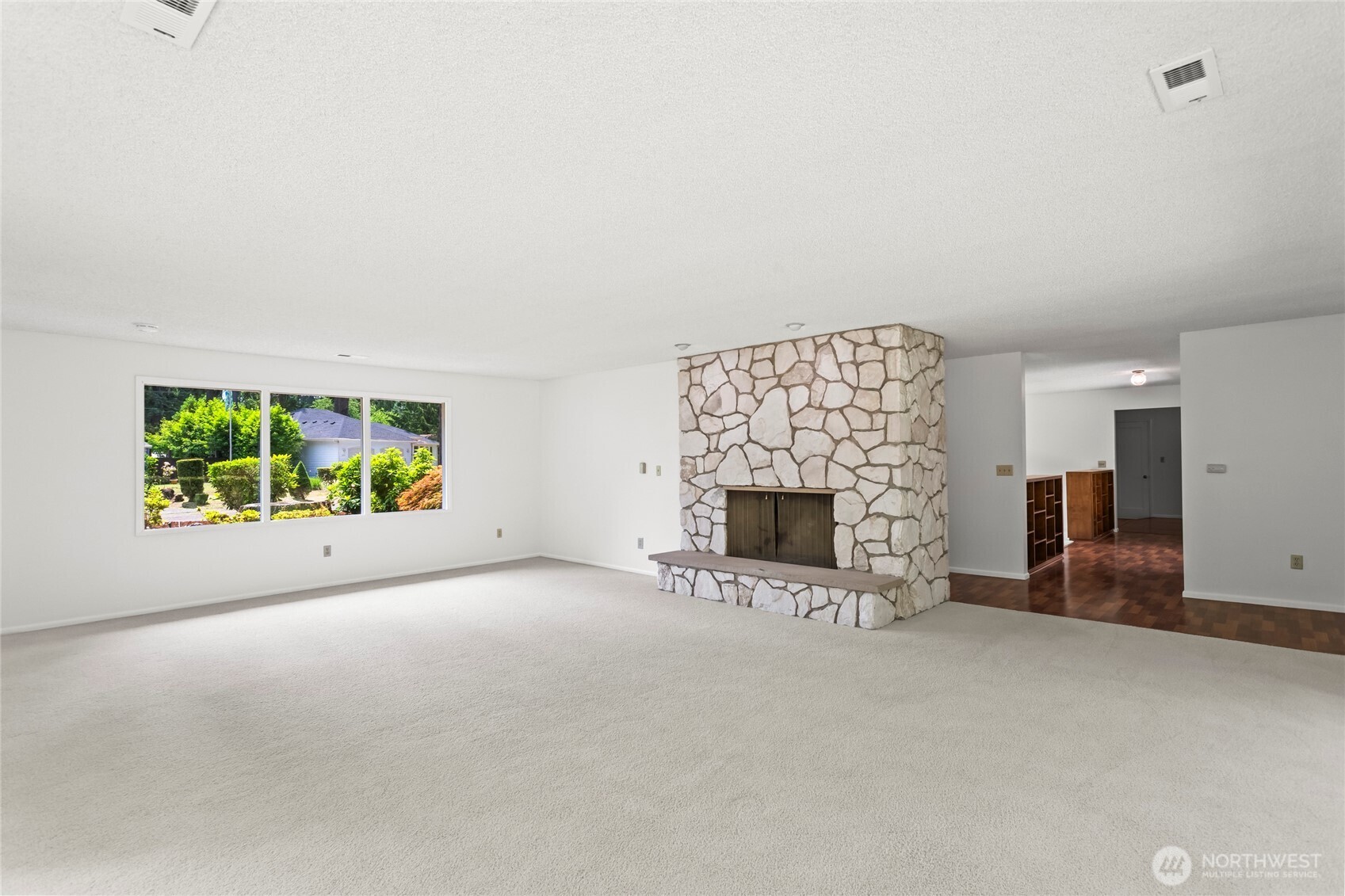 Different angle of Great room looking out towards the front of the home.
