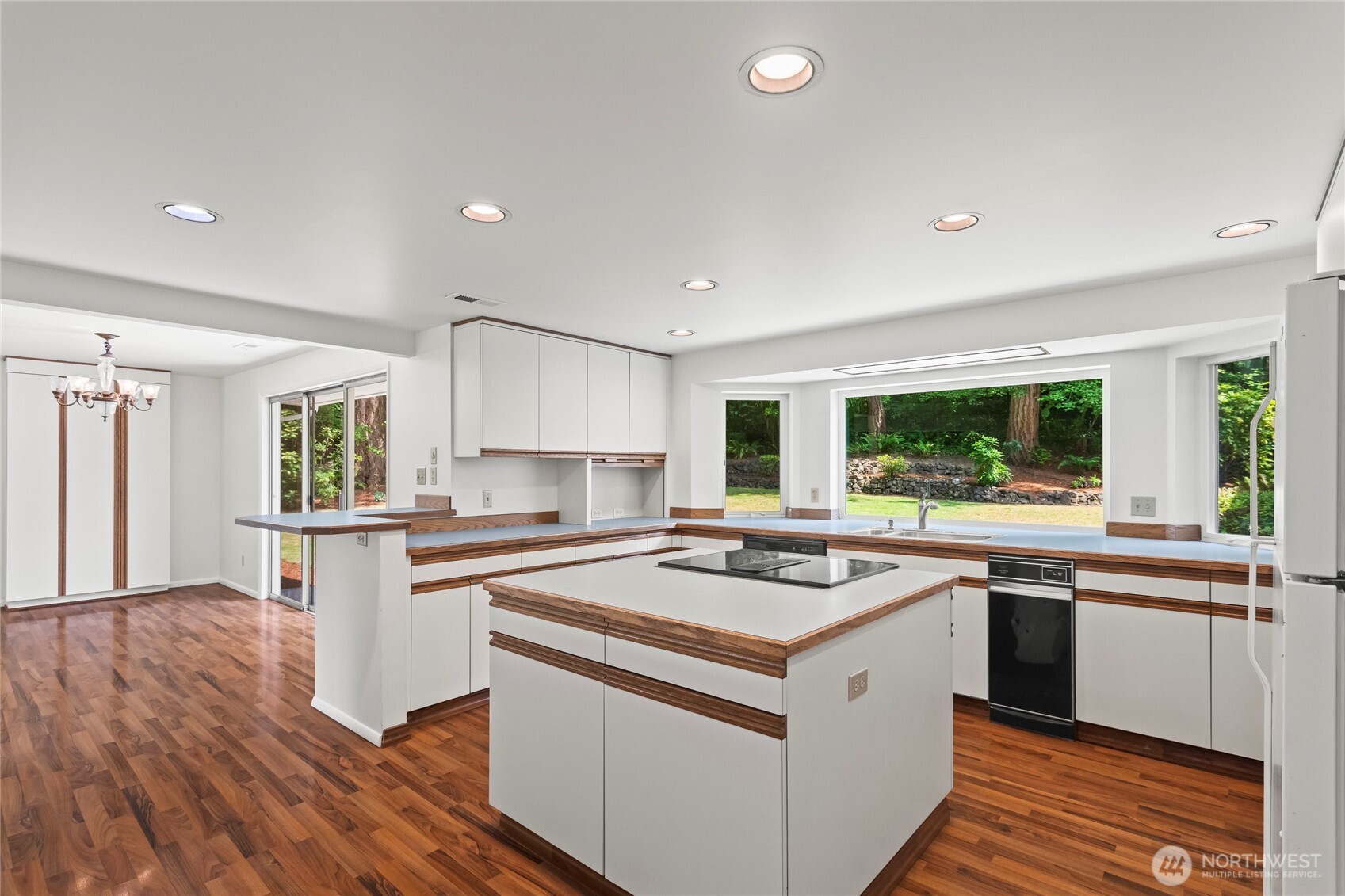 Huge open concept kitchen with tons of counter space and an Abundance of natural light.