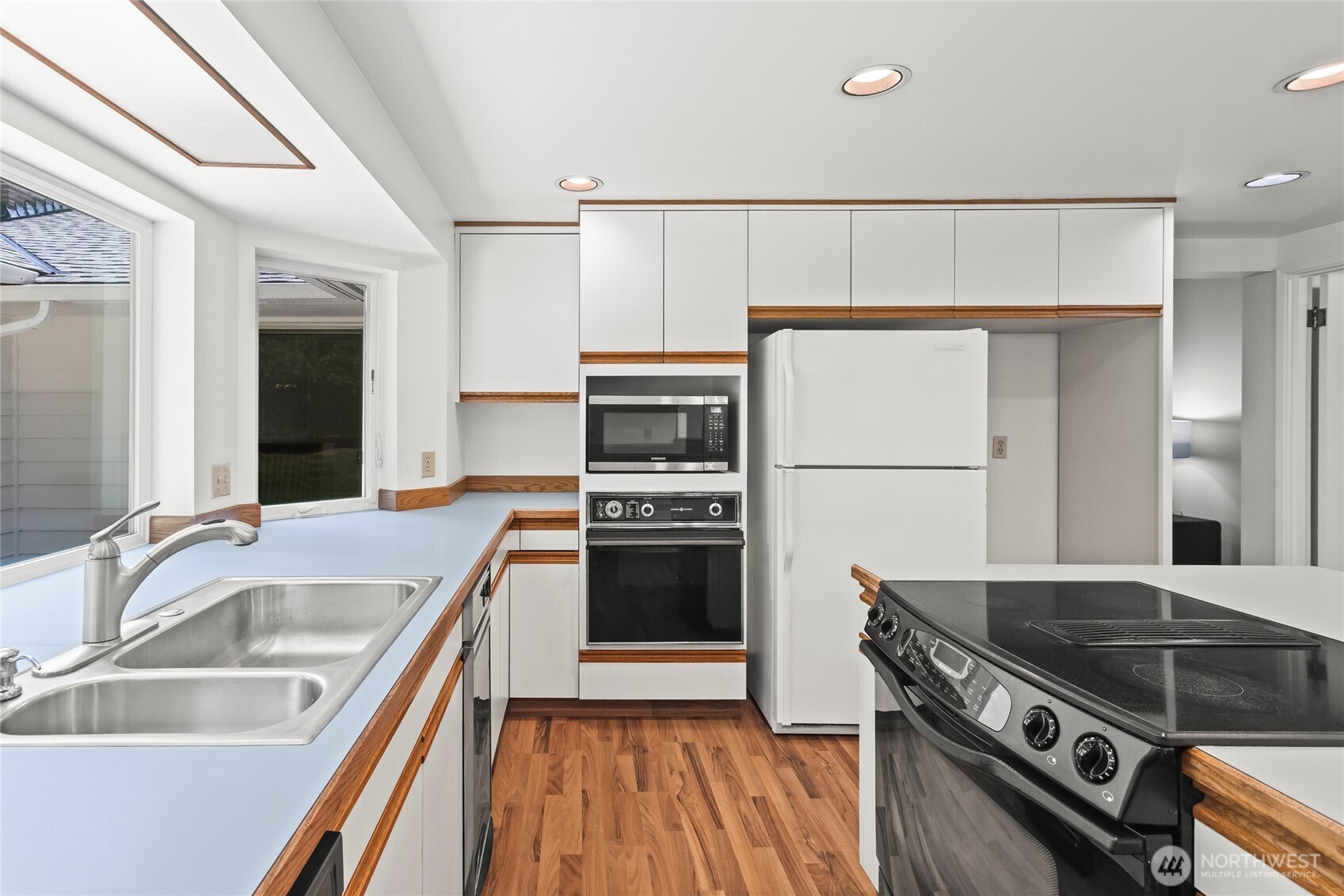 Another view of the kitchen.2 ovens and plenty of cabinet space.
