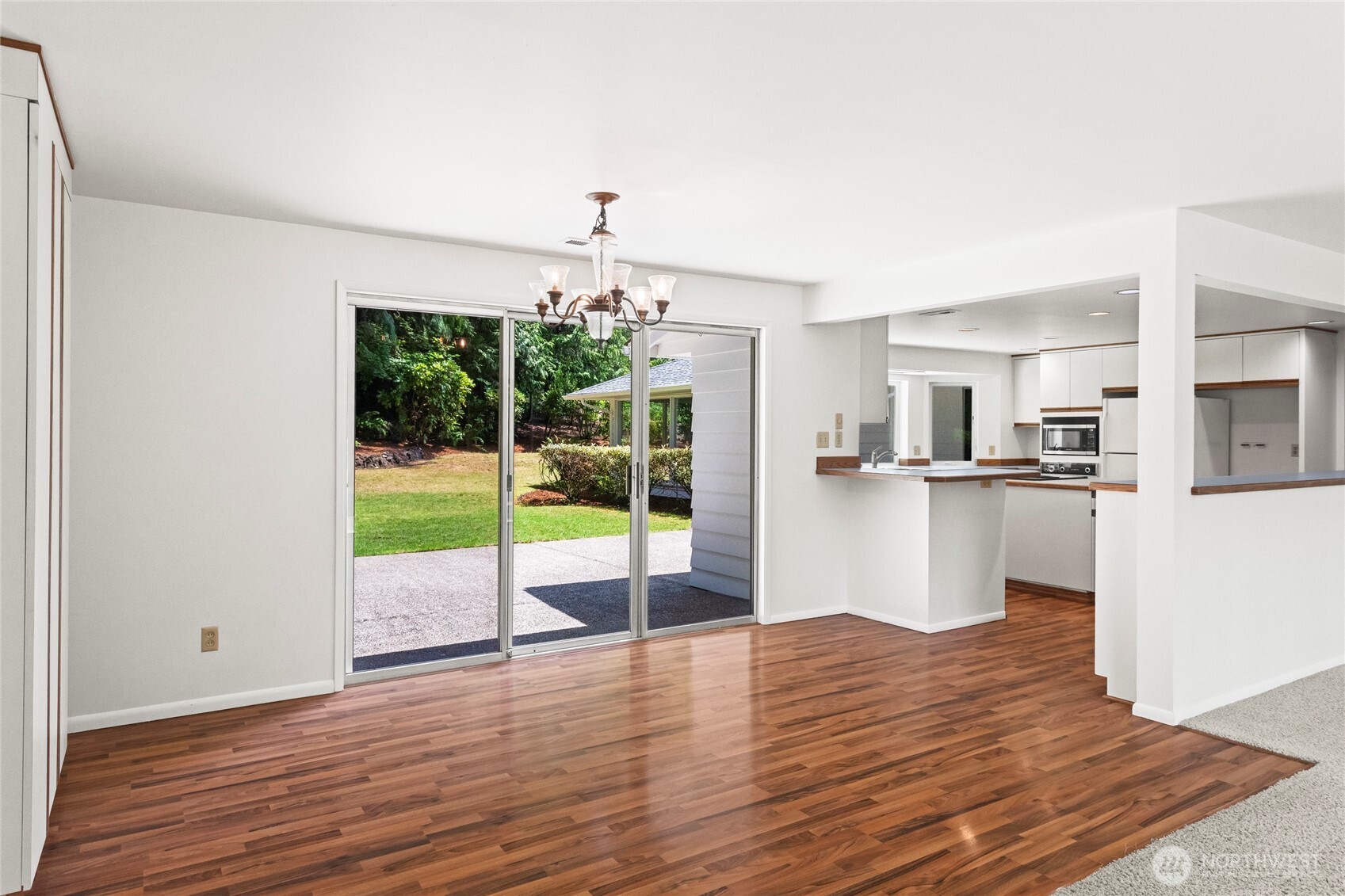 View looking into dining area with access to both the kitchen and backyard.  Perfect for entertaining and back yard bbq,s