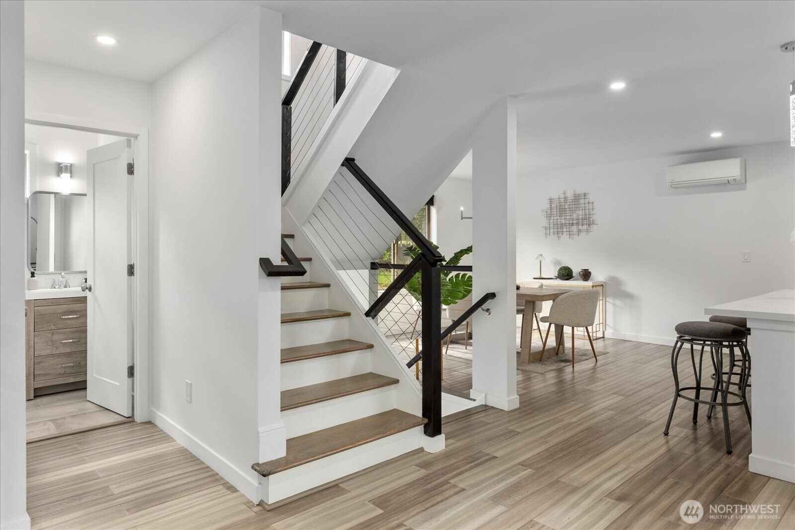 Custom railings accentuate the stairwell.
