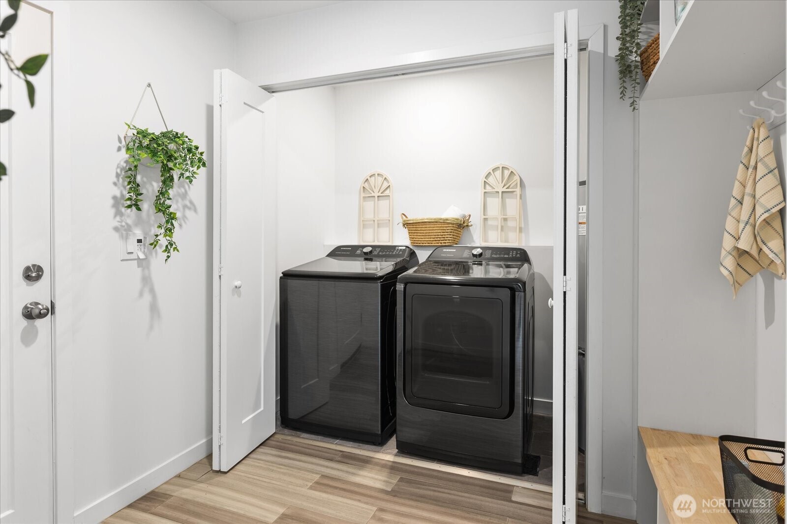 The laundry area with generous storage and folding area.