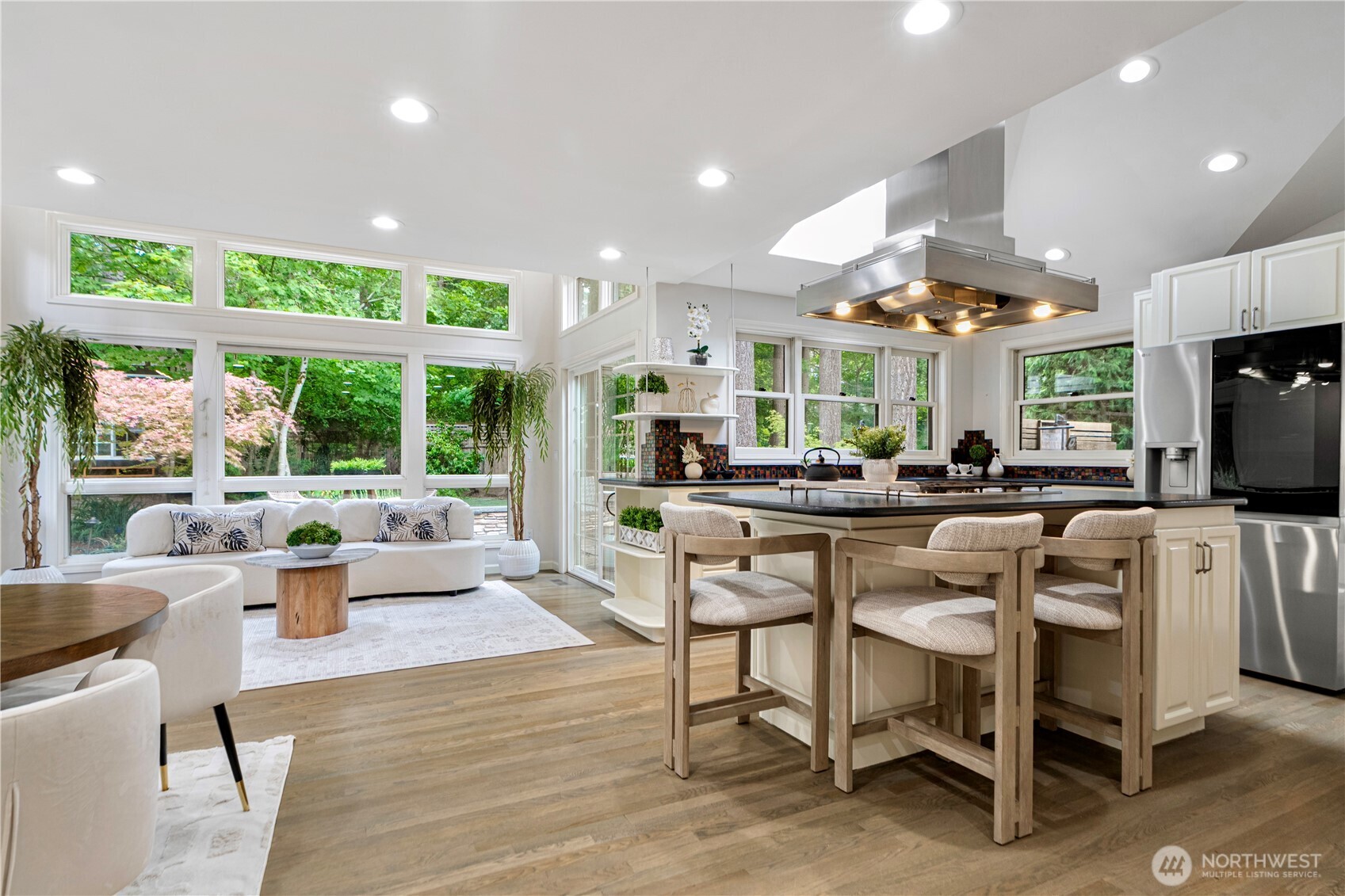Kitchen island with a granite countertop and cabinetry
