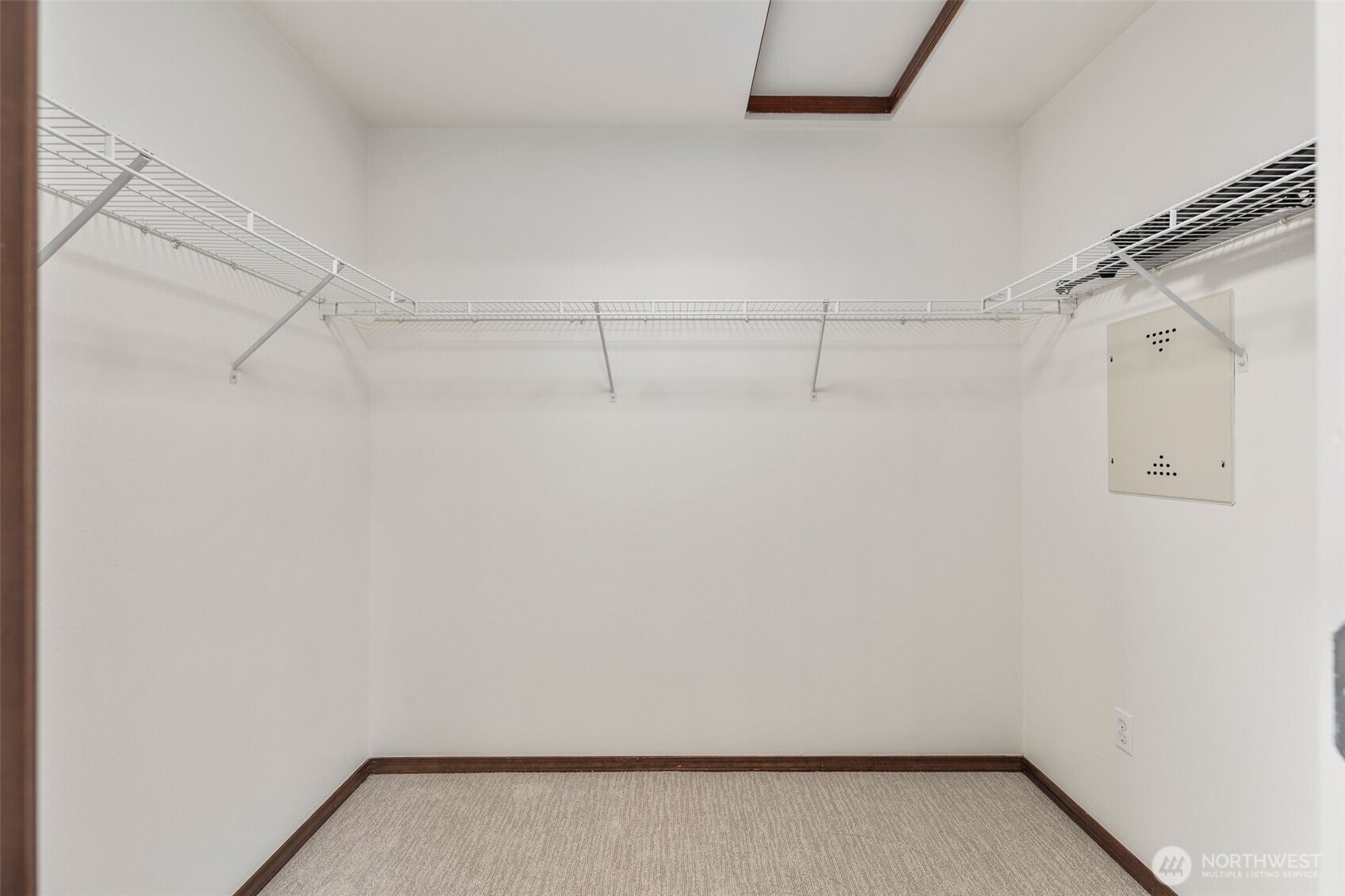 Large walk-in closet inside primary bath.