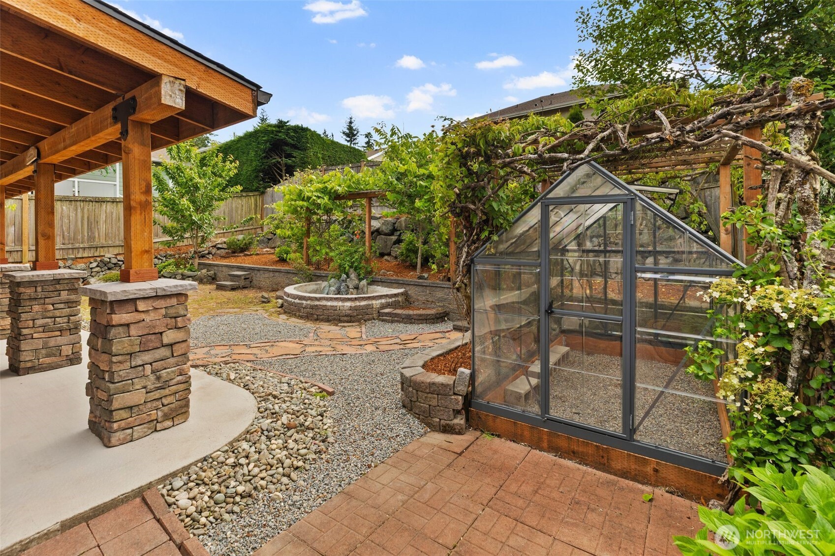 Beautifully vined greenhouse, ready for the growing season!
