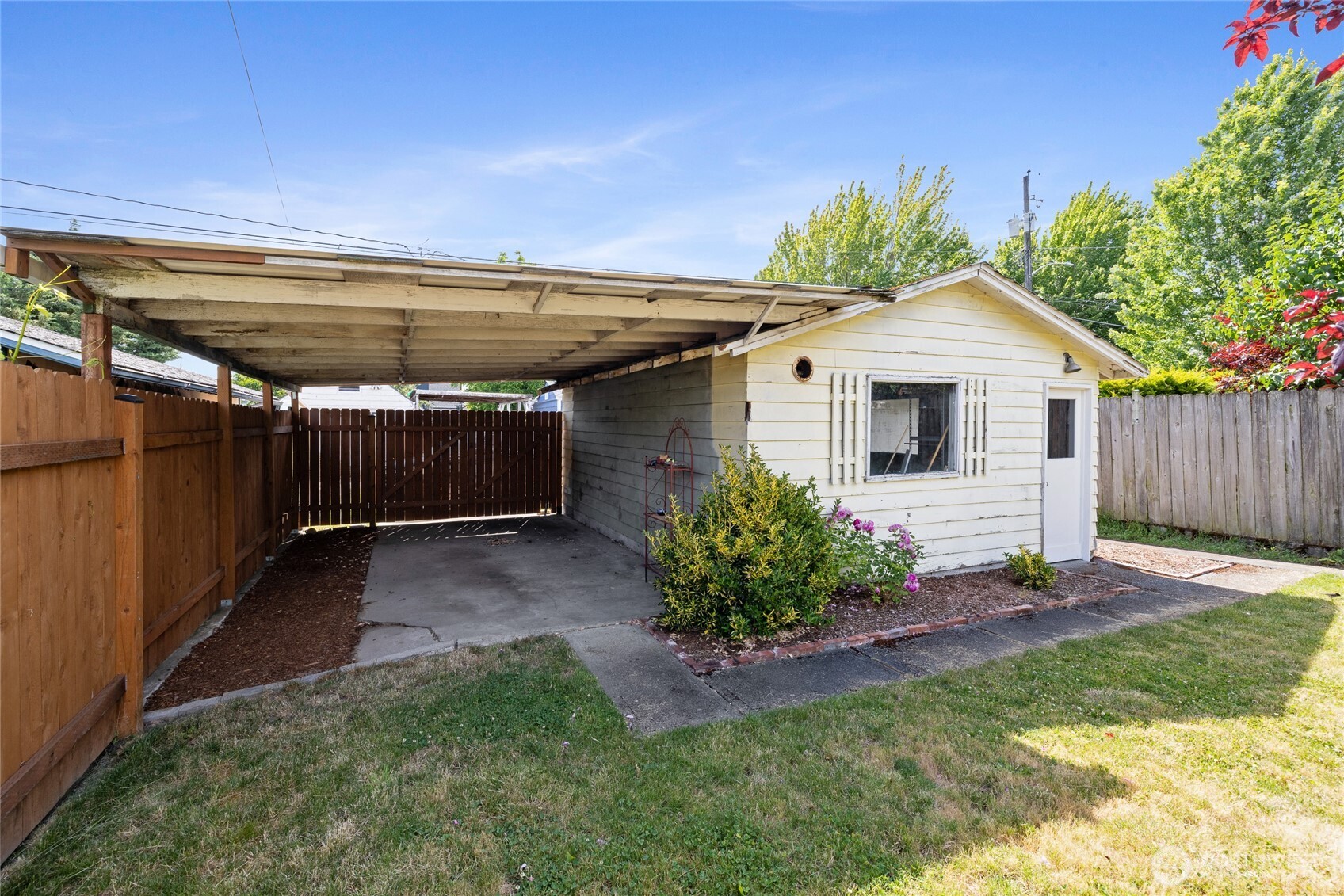 Two car garage, carport and alley parking!