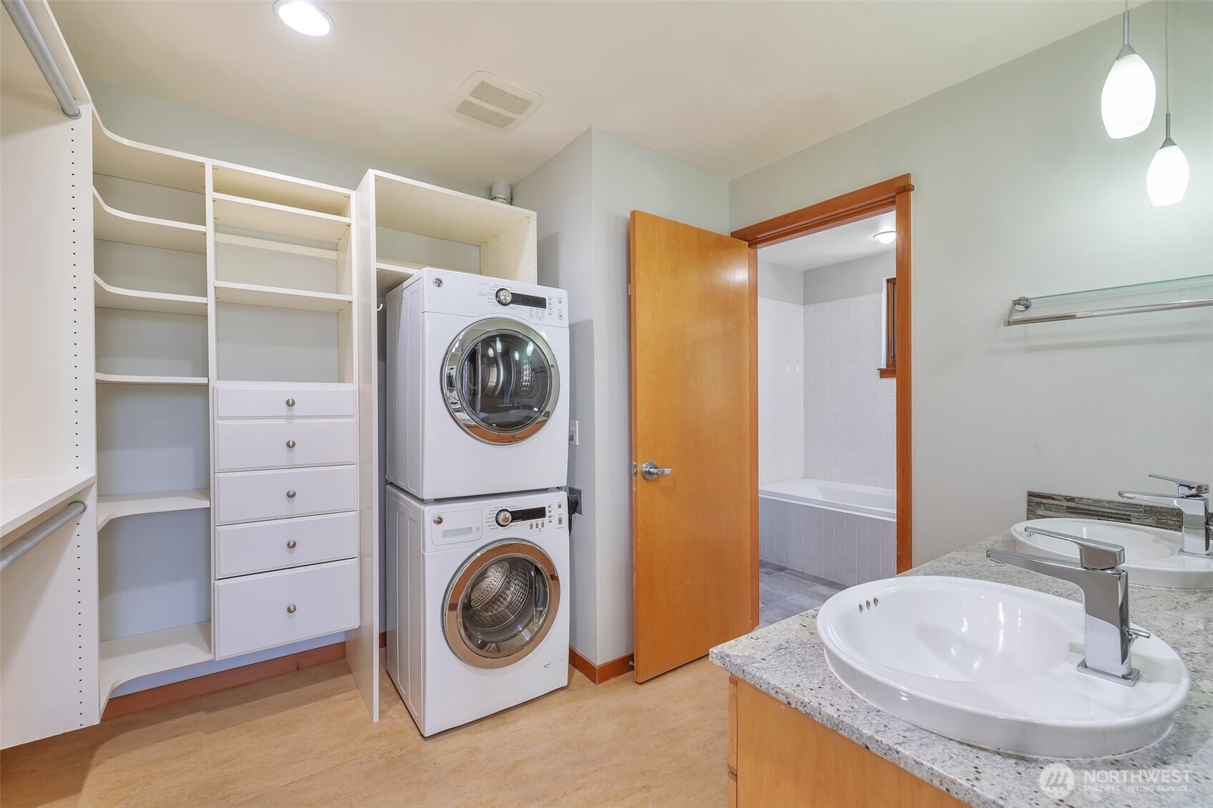 Walk-in closet, double vanity and laundry.
