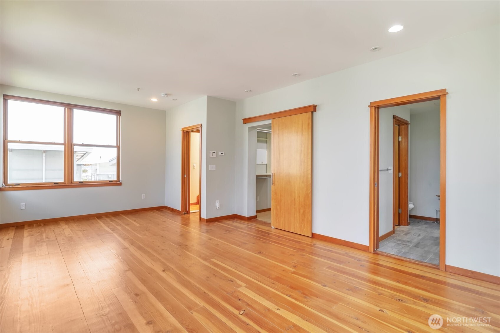 The primary bedroom suite is spacious enough to accommodate a sitting area and features a 5 piece bath, walk-in closet area and in-suite stacked washer/dryer.