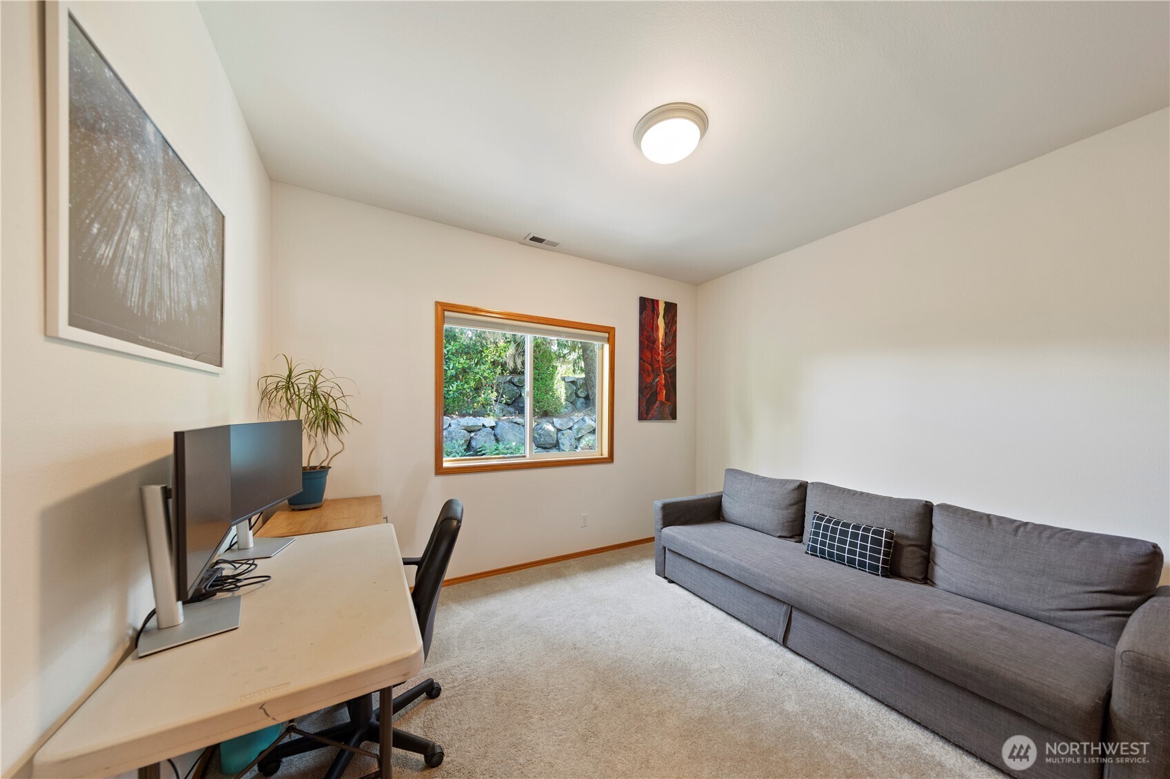 Bedroom #3 is being used as an office with a sleeper sofa. Perfect work/guest room.