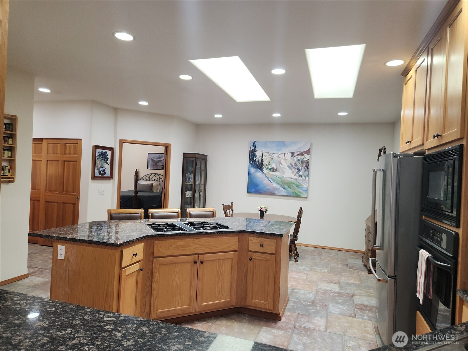 Gorgeous chef's kitchen with so much prep counter space. This view is from the large pass-through window into the great room.