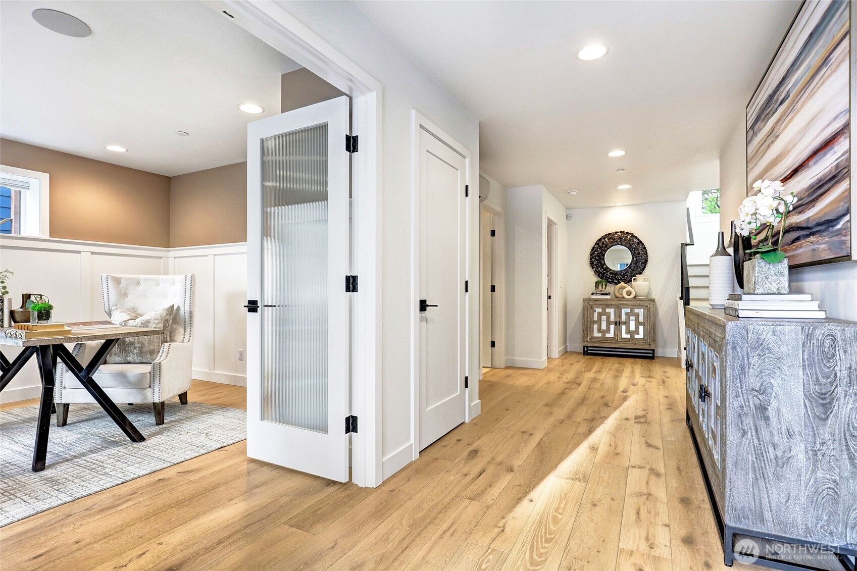 Welcome home! Charming entry with home office just inside the front door and perfectly located guest suite!
