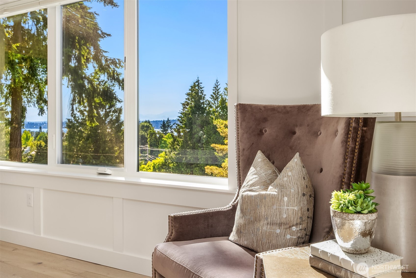 Enjoy lake, mountain and sunset views from your primary bedroom!