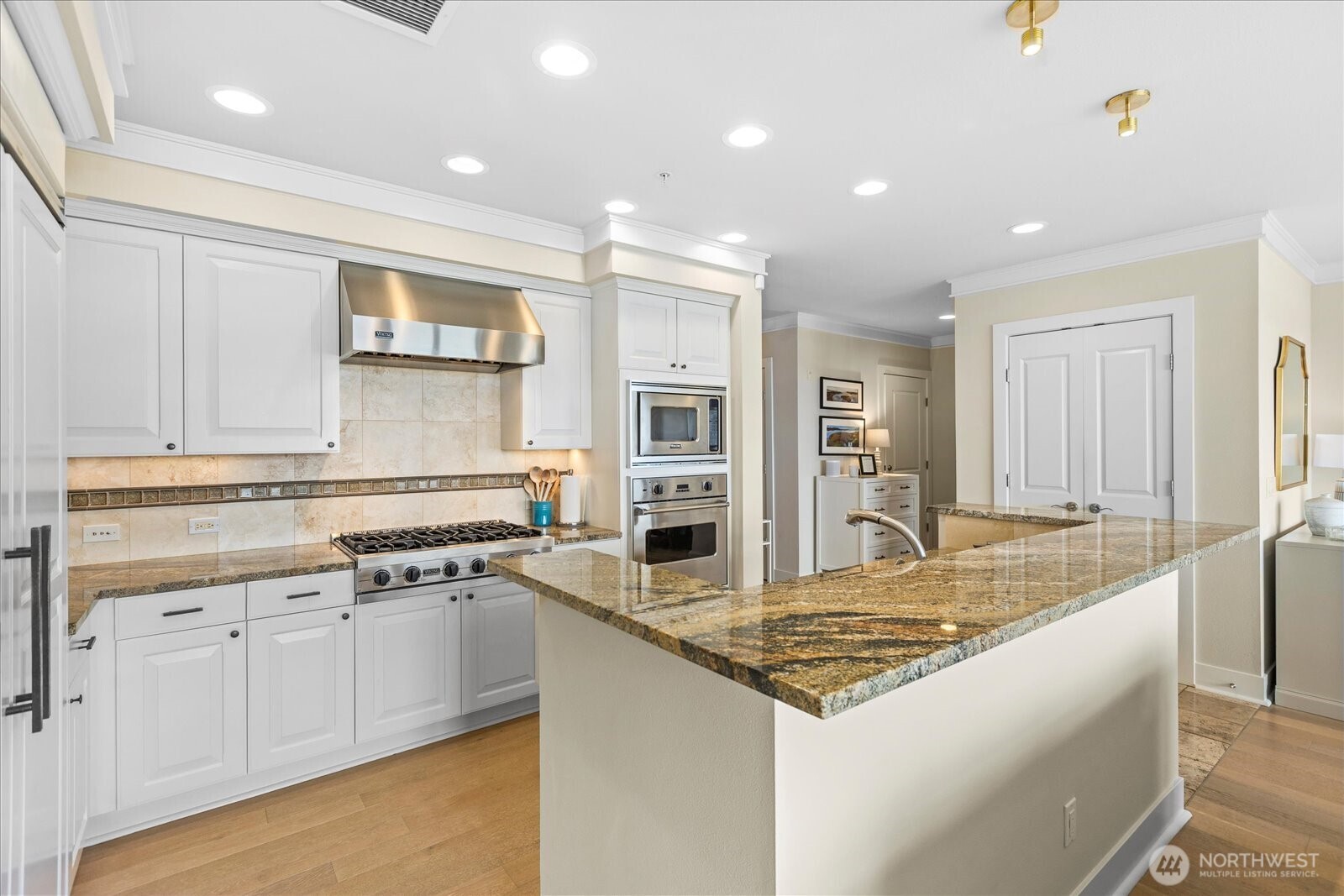 Miele Dishwasher and Viking stainless appliance package . .