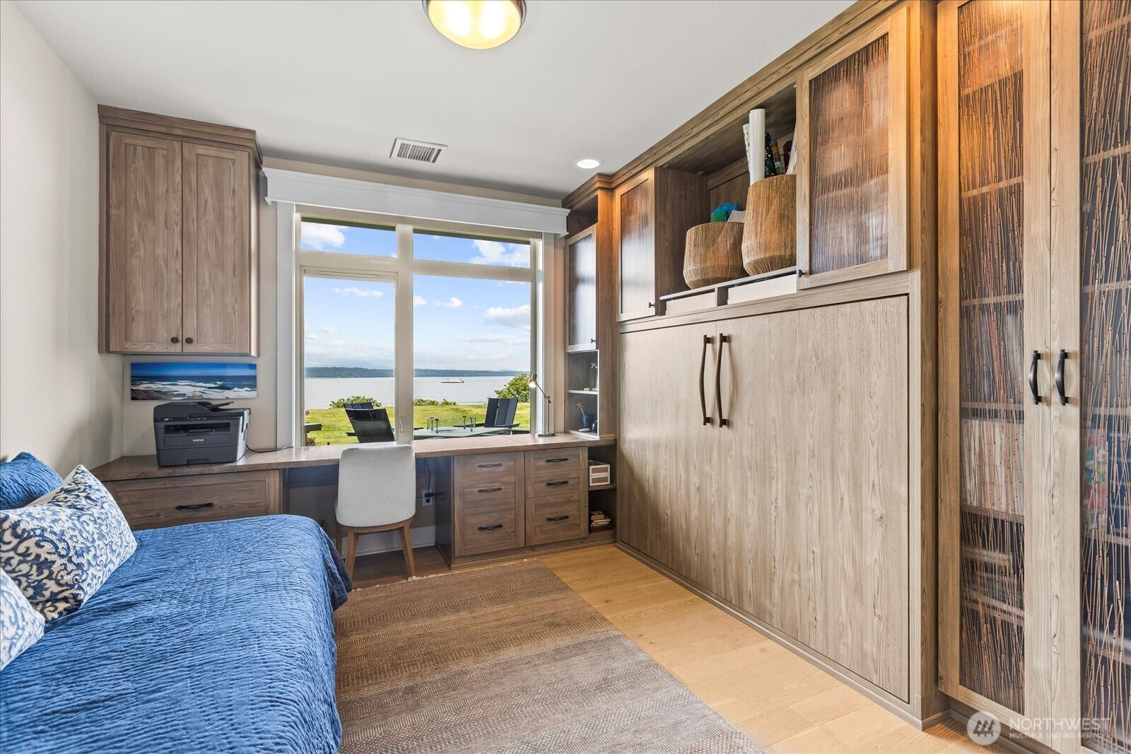 2nd bedroom houses built-in Murphy bed and desk area and 'on the view! Plus . . .