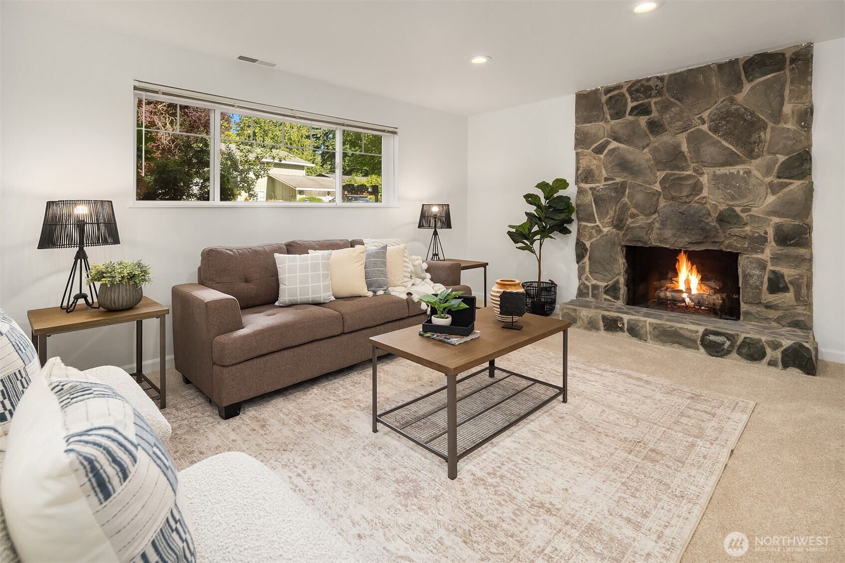 Lower level living area w/wood fireplace