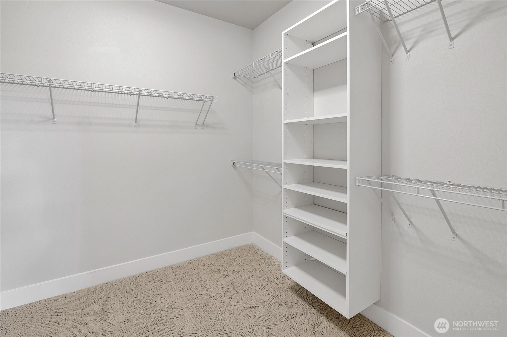 Walk-in closet with built in shelving (Photos from lot 9B)