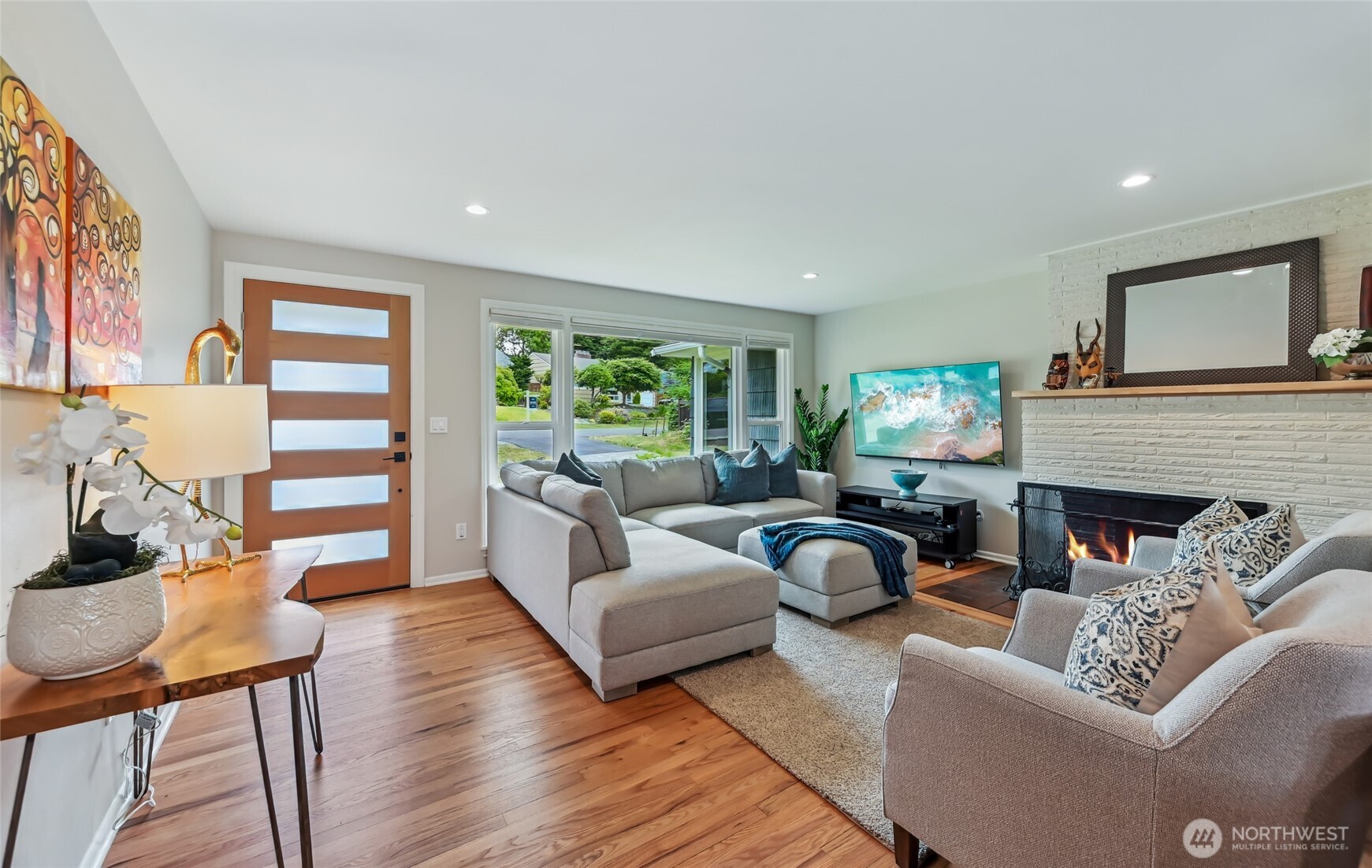 You will love all the sunlight that comes through the huge windows in the living room.