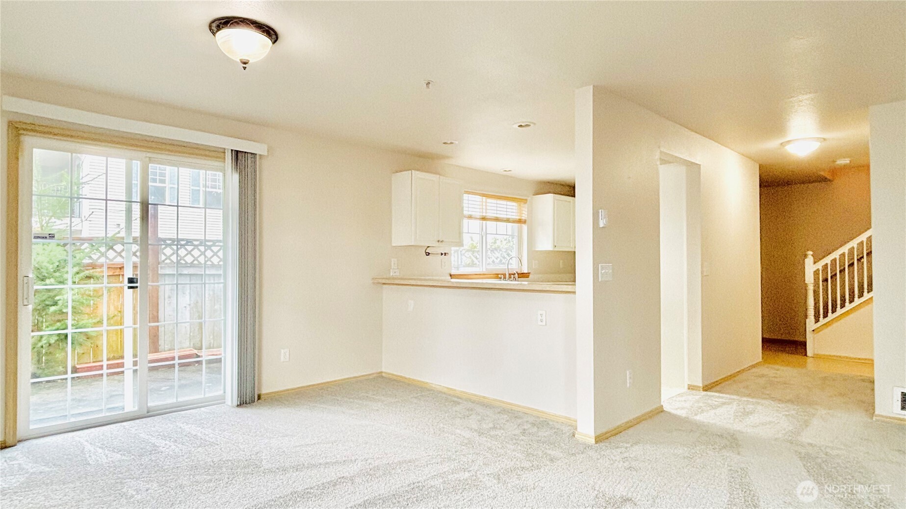 dining room opens up to Fenced Patio