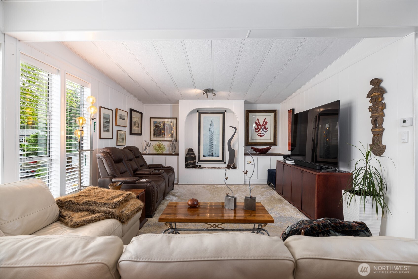 A view of the spacious second living room, also bathed in natural light