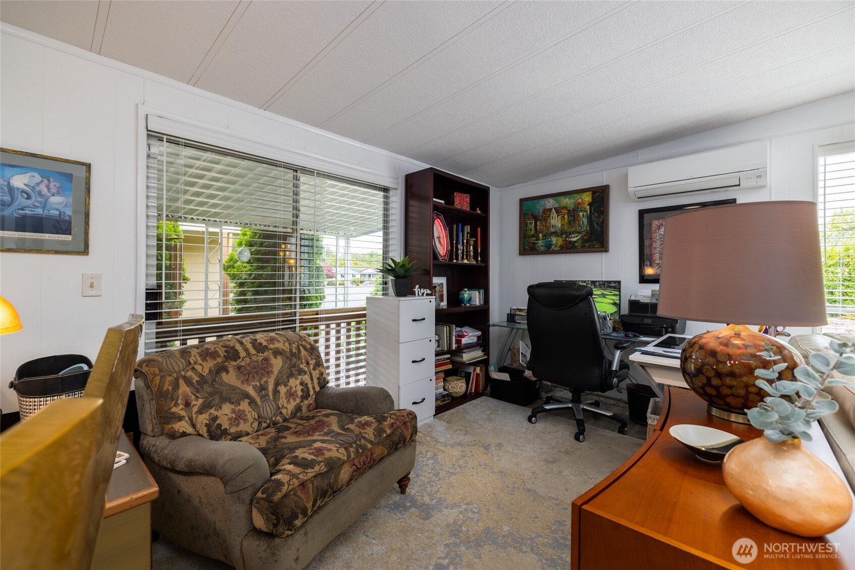 A living space large enough to create a sitting room and an office!