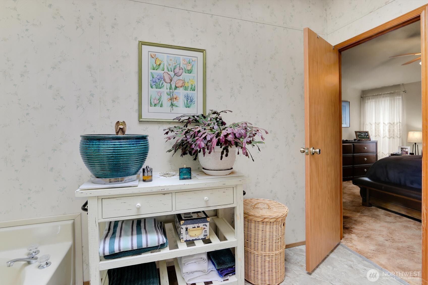 Primary Bath that opens into the Primary Bedroom.