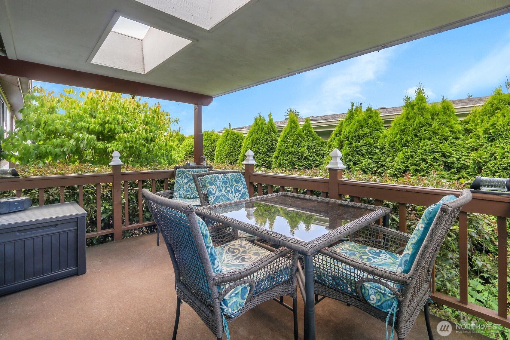 The Slider in Family Rooms leads to this Private & Covered Deck with Skylights!