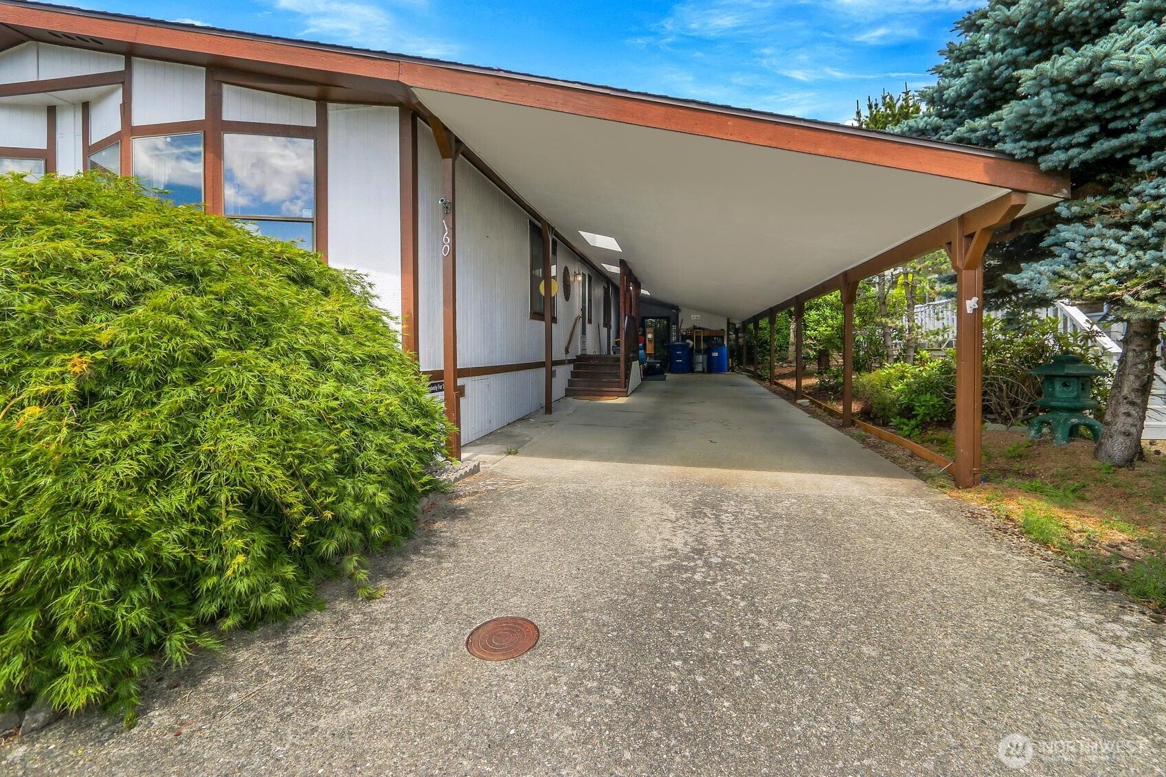 3 Car Covered Carport with Storage Shed!