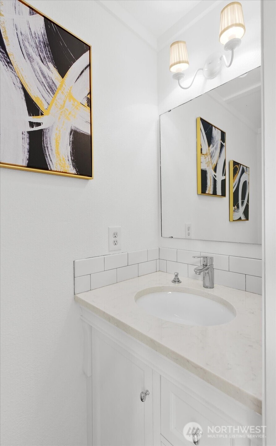 A half bath is tucked in between the family room and living room.