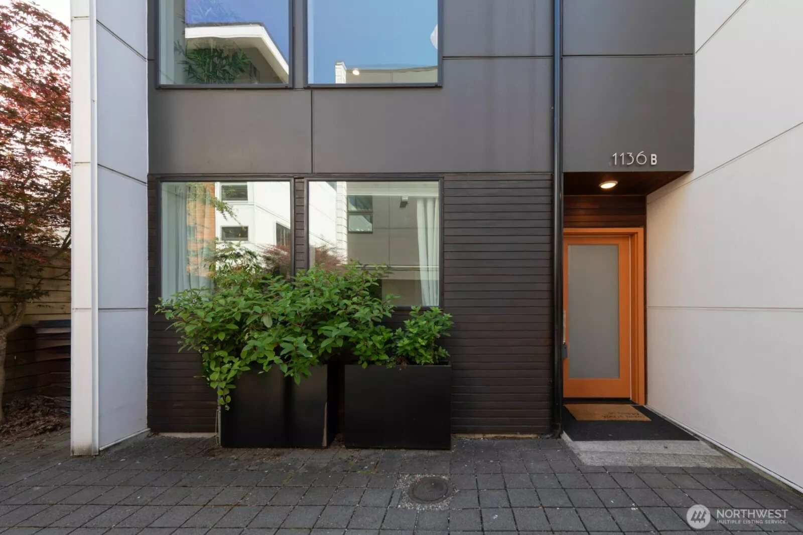 Welcome home to 1136B, your own private entrance tucked at the back of the community.