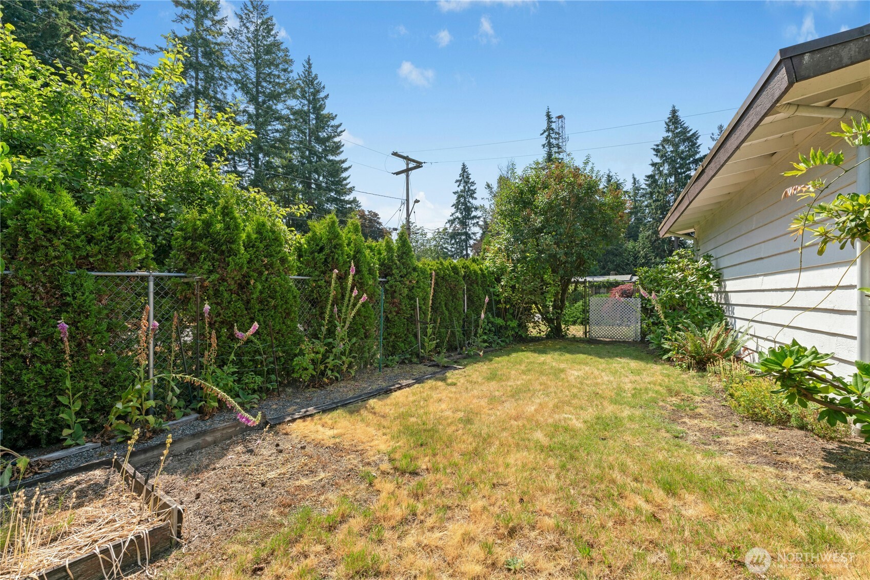 Gardening is fun on this sunny lot.