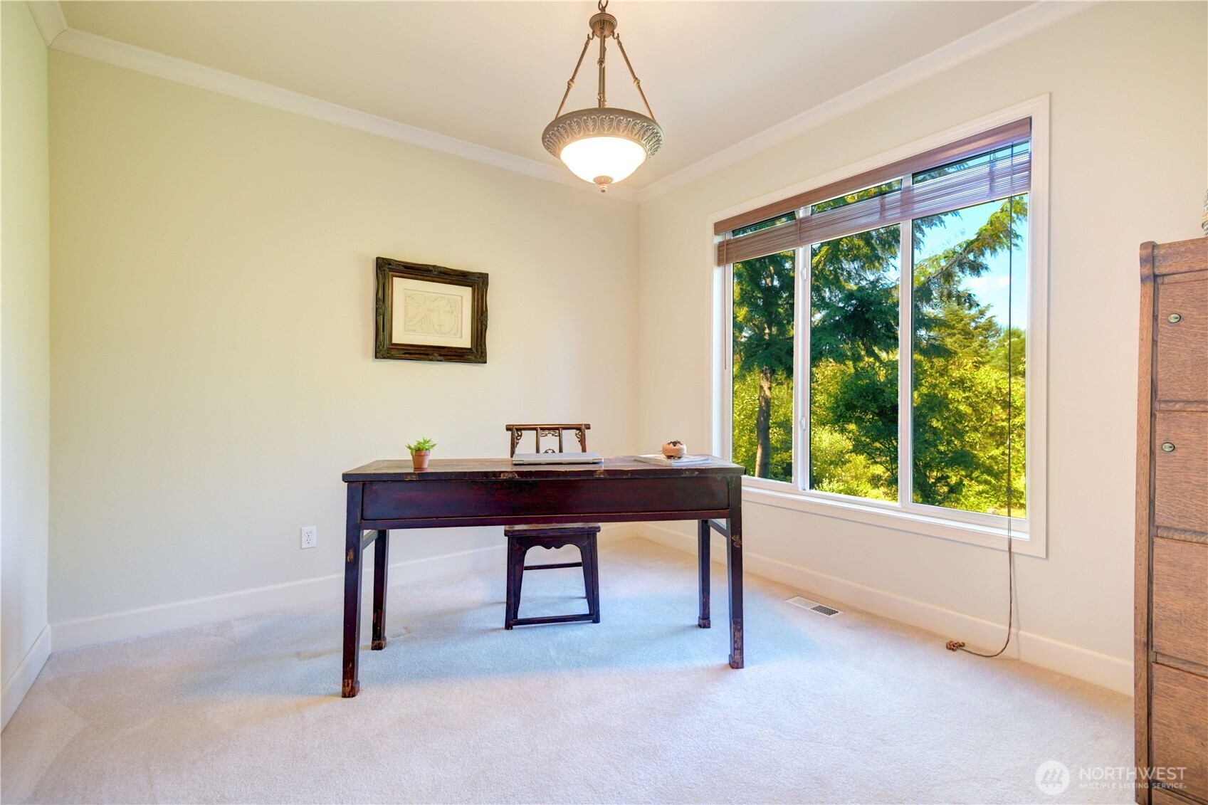 Main floor family room with a cozy gas log fireplace.