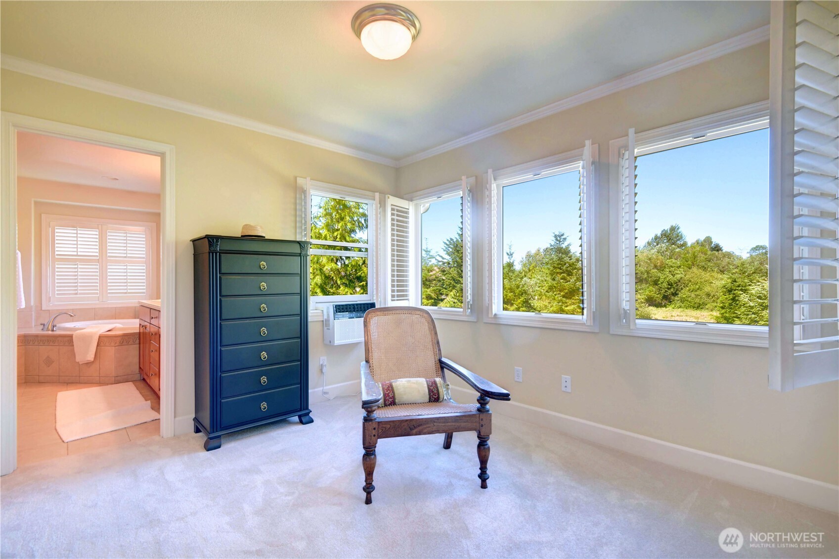 Upper laundry room with full capacity of washer and dryer, many cabinetries, utility sink.