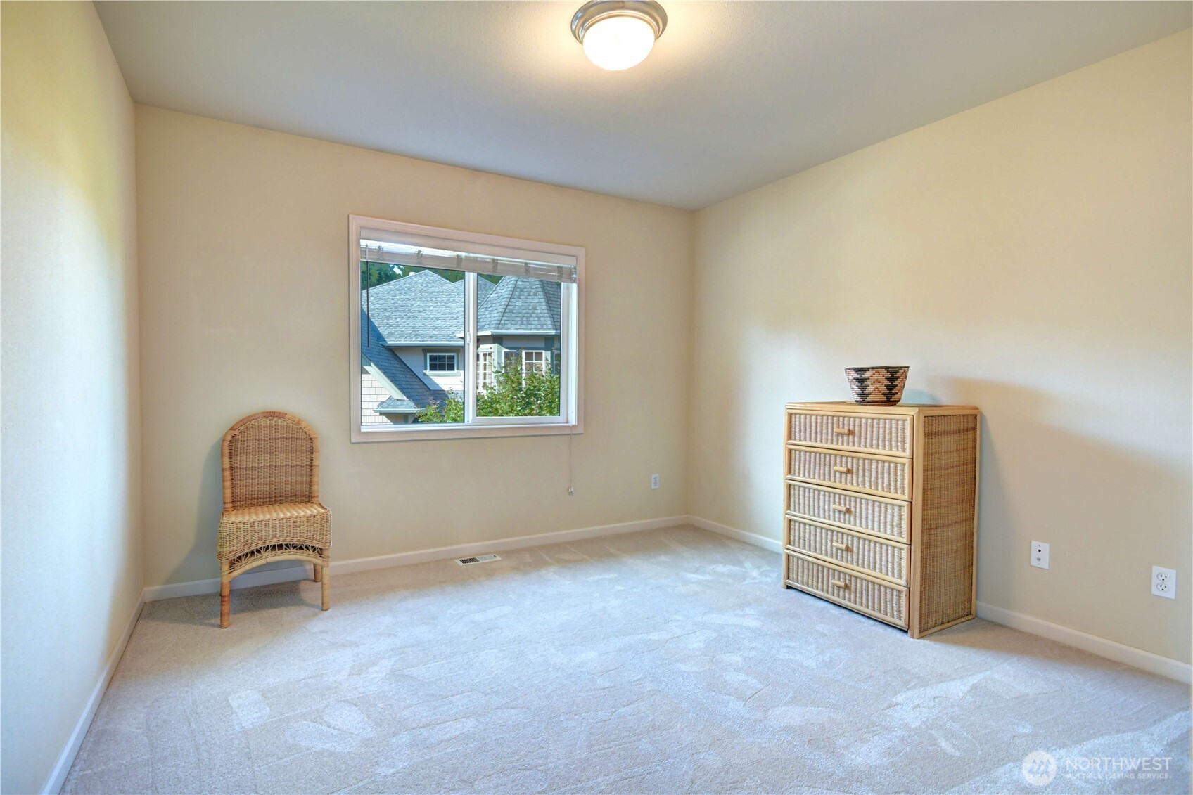 Siting area in master suite. Great for reading or nursery room. Window air conditioner is here.