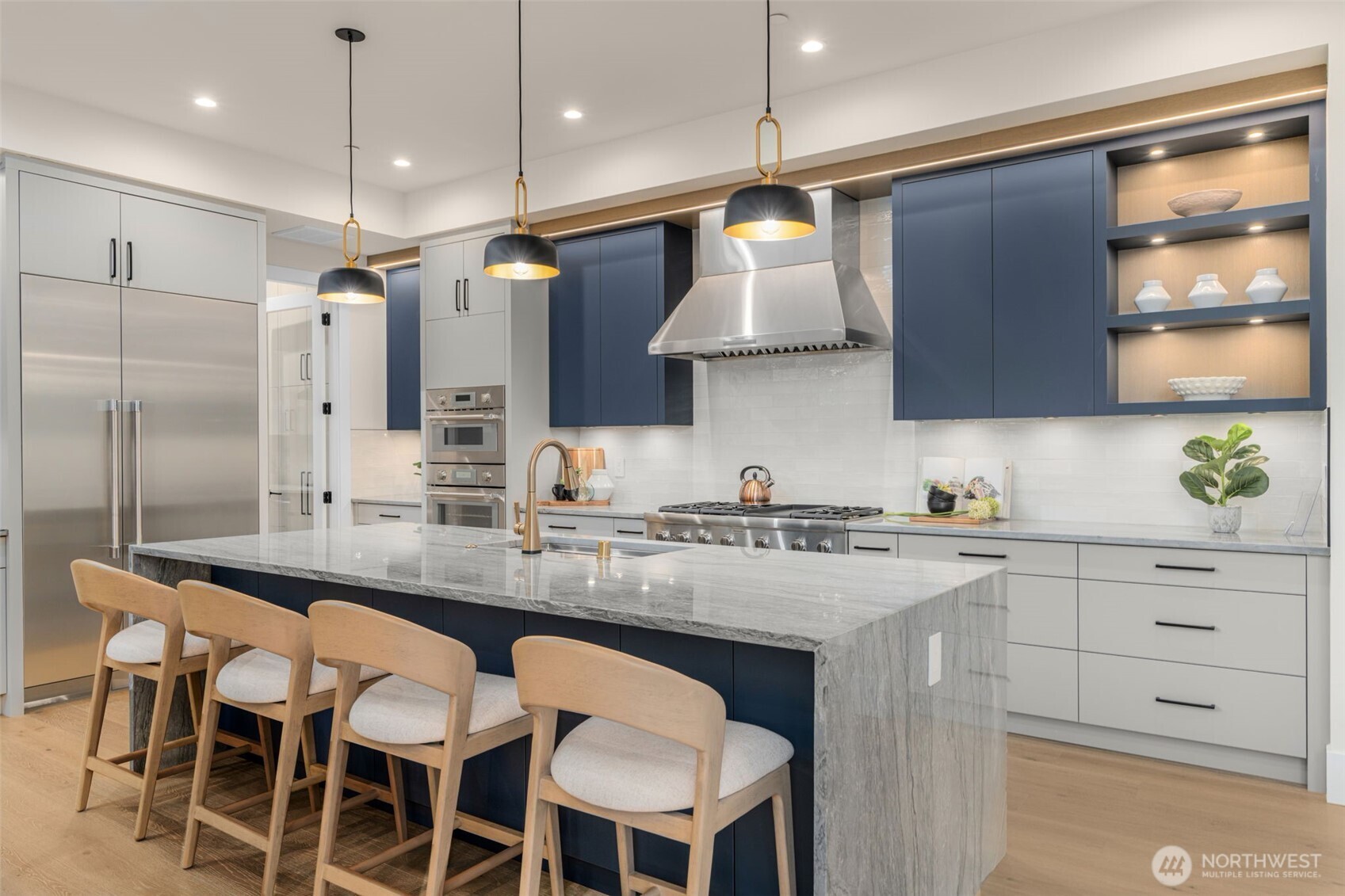 Designer kitchen with full wood custom cabinets and Sensoan acrylic