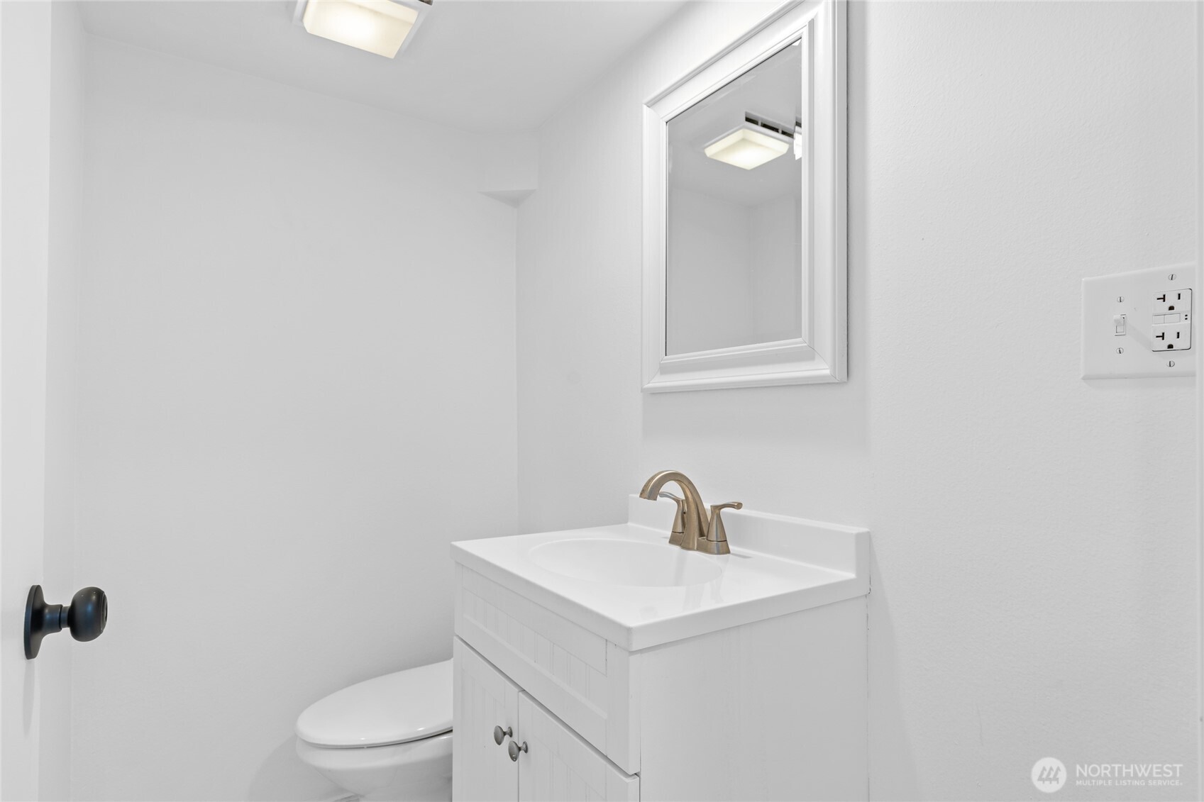 Lower level second bathroom with walk-in shower.
