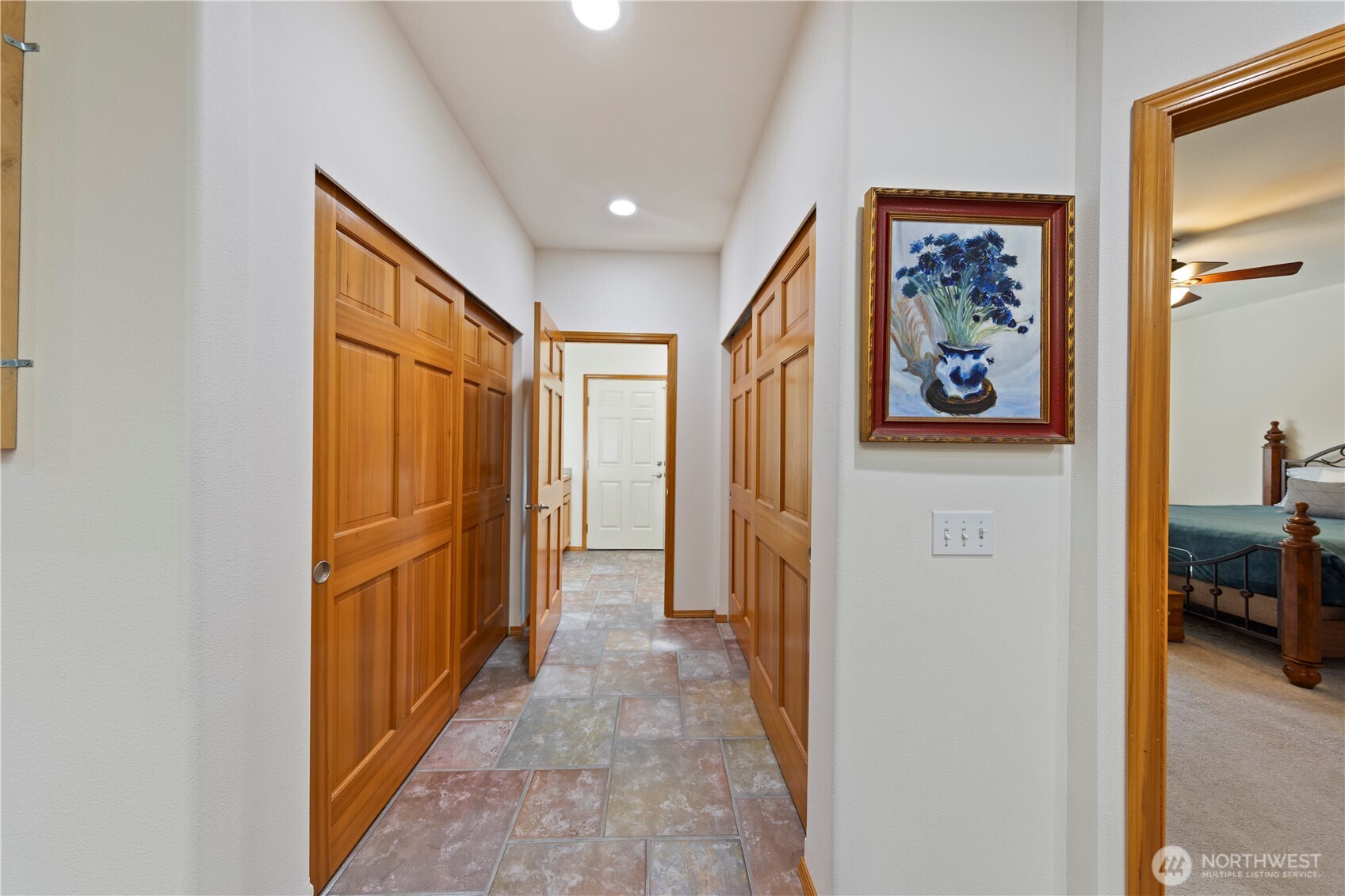 From the kitchen, huge double pantry closets lead to the laundry/utility room.