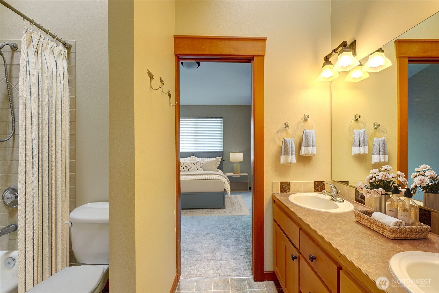 Jack & Jill Bathroom Flooded with Natural Light
