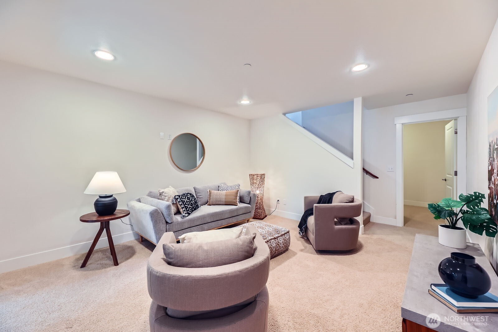Lower level media room - great for movie watching! - and 8x10 extra finished room.