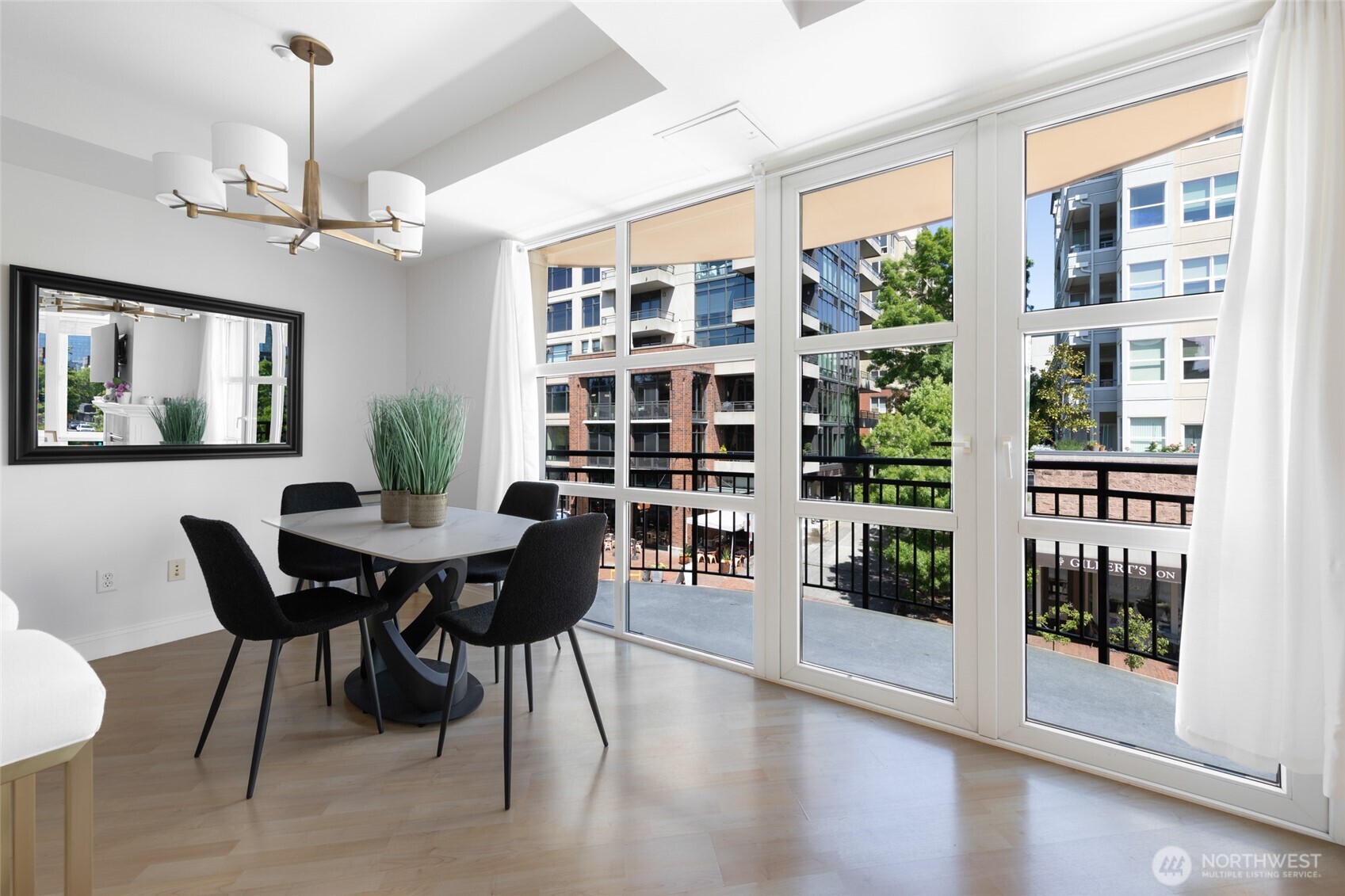Dining room with owner's furniture prior to staging.