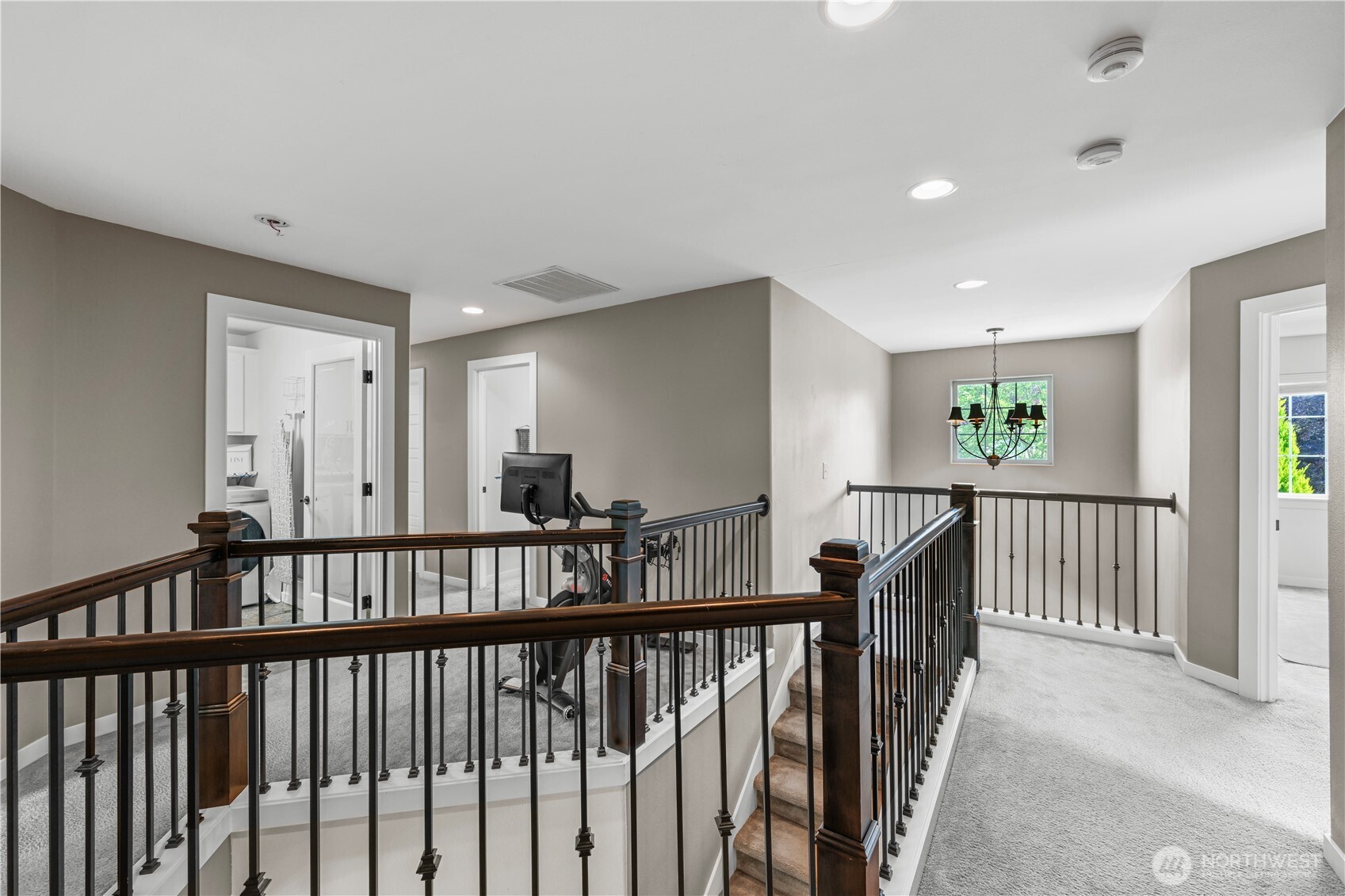 Open staircase helps upstairs feel bright and spacious