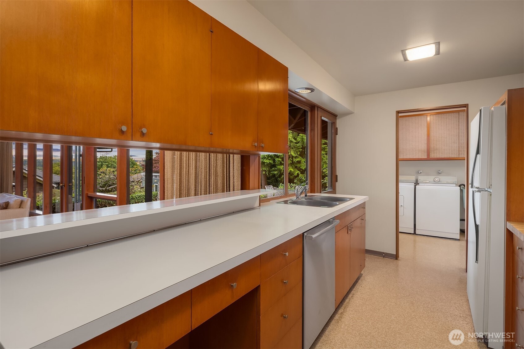Kitchen cabinets are custom made by OB Williams