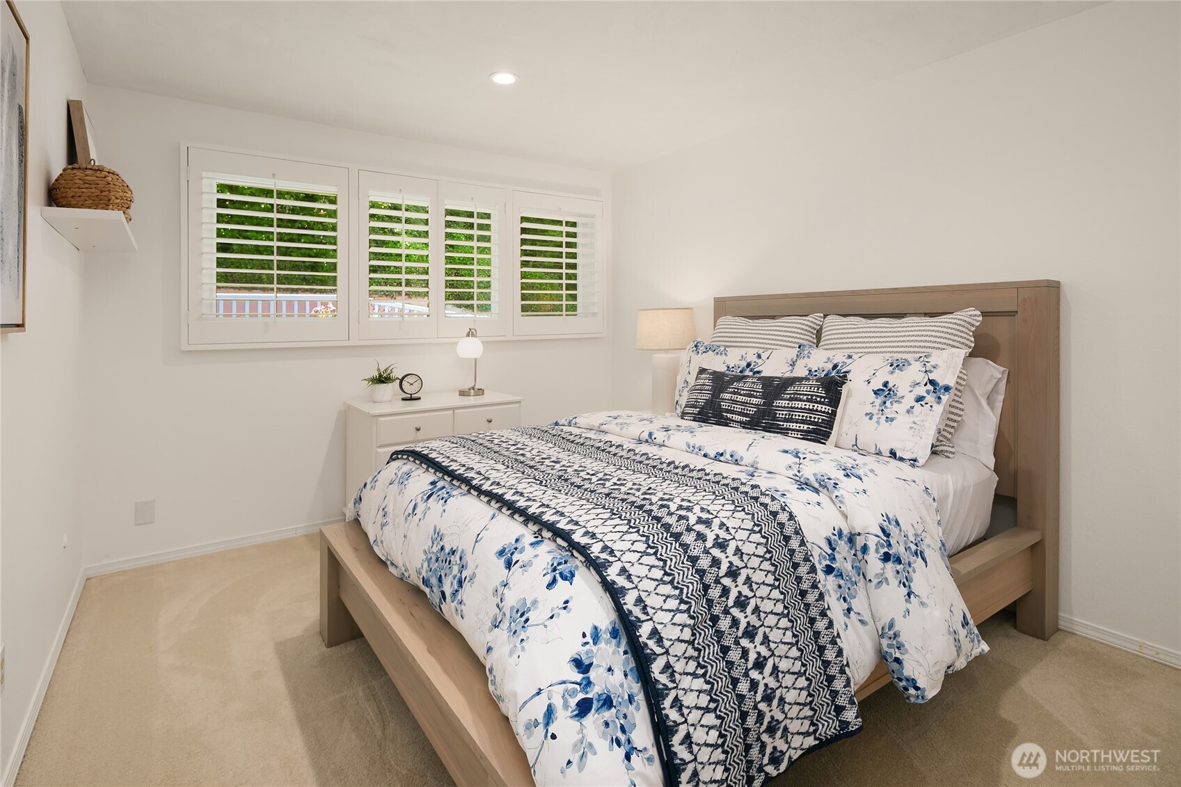 Second main floor bedroom is light and bright.