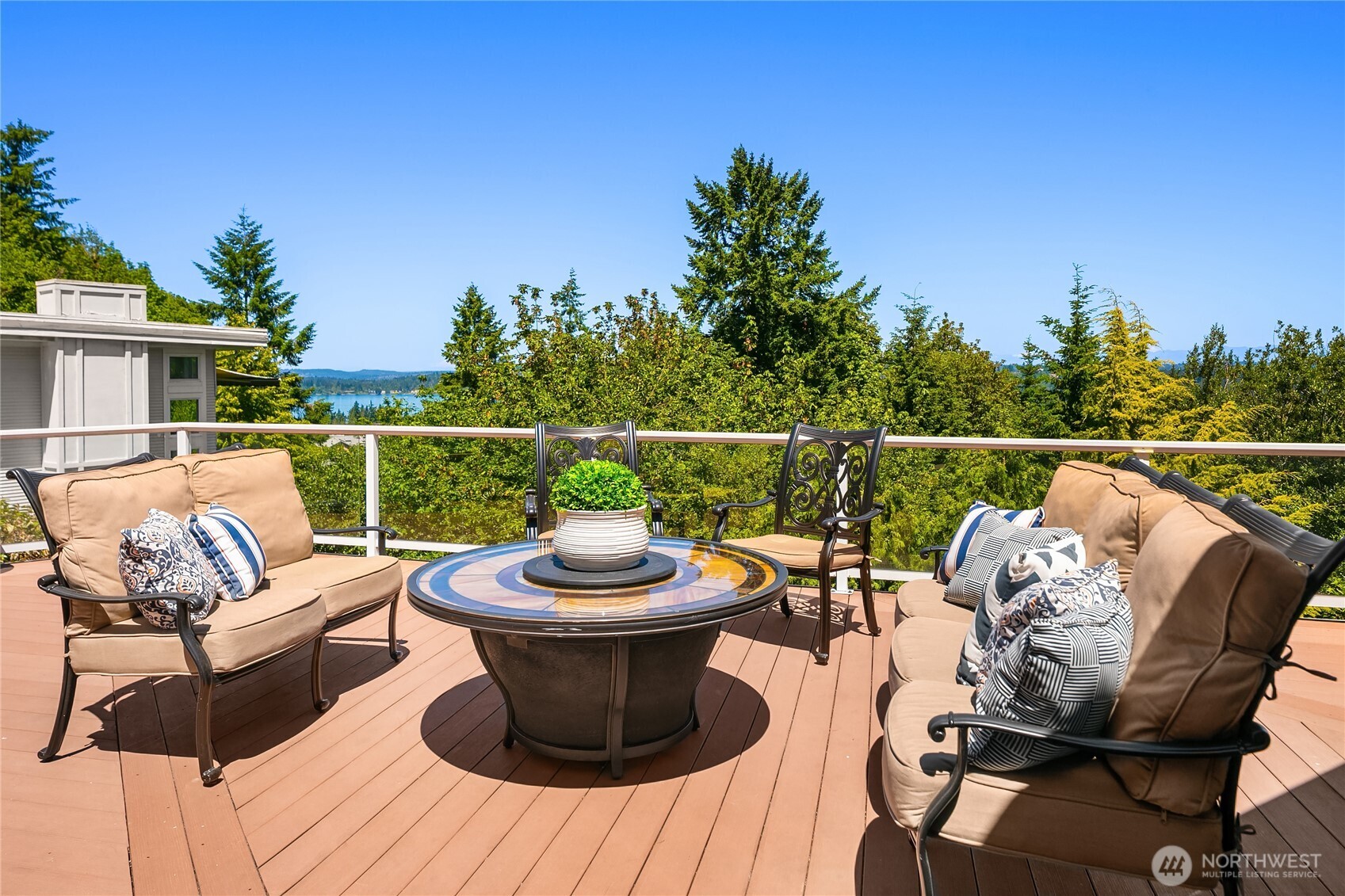 The oversized deck is large enough for dining, cozying up to the firepit and taking in the views.