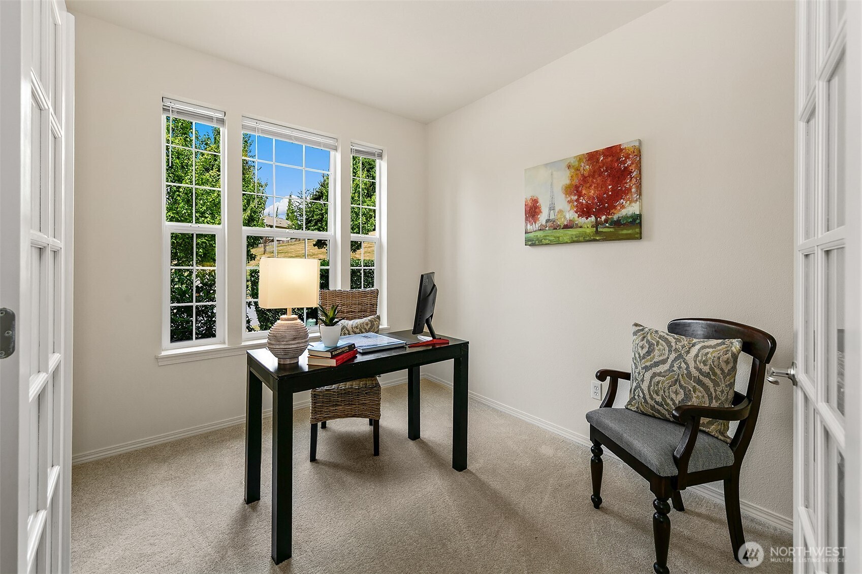 Main floor den/office with French doors.