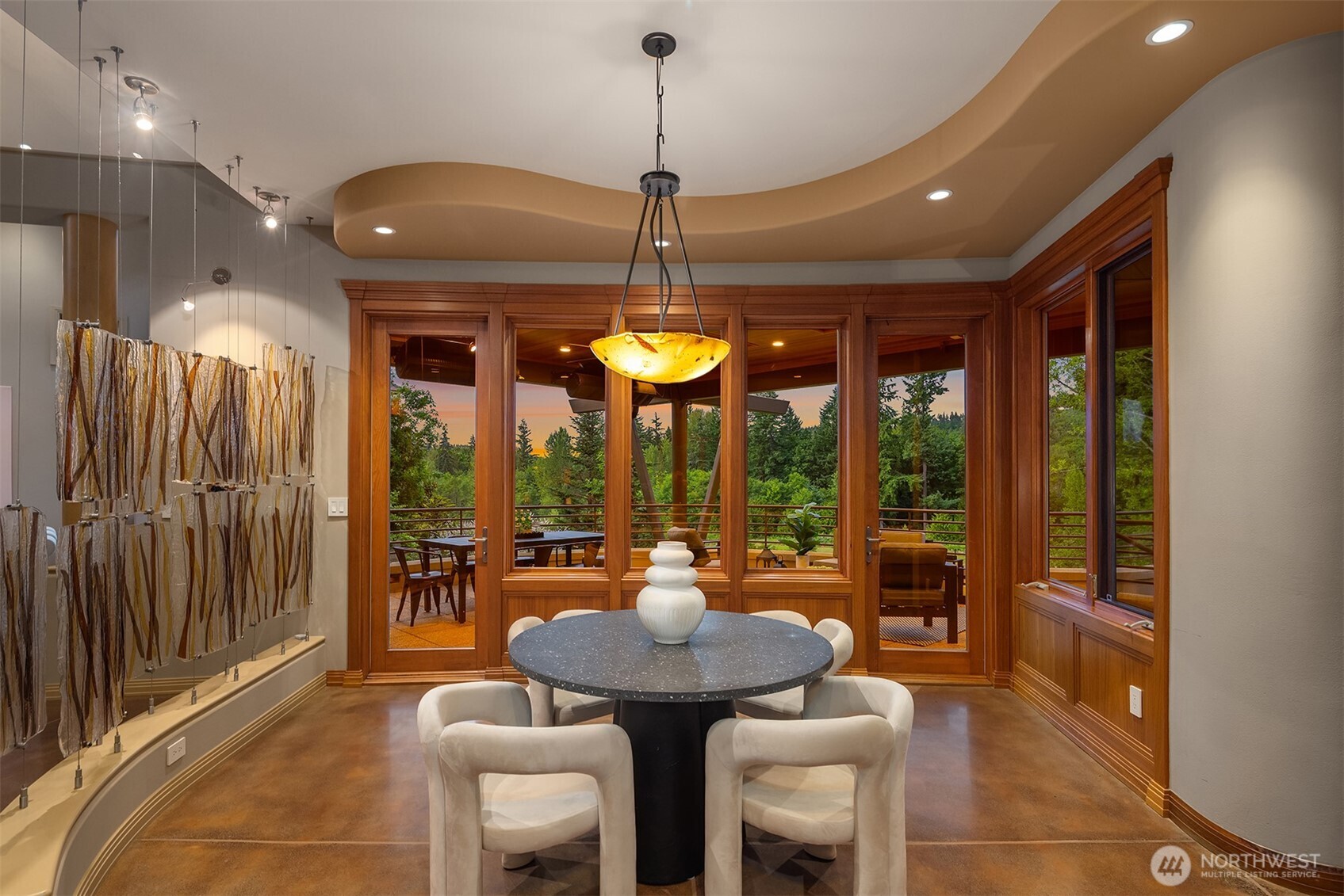 Spacious breakfast nook with doors out to deck and hot tub