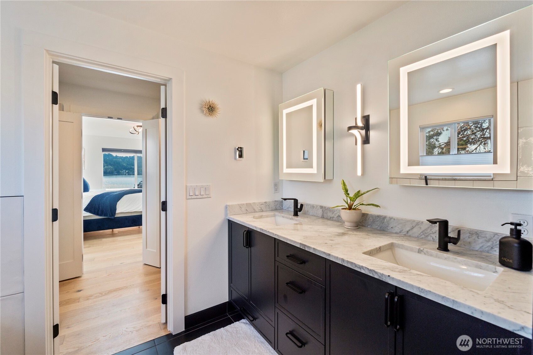 Double sinks with custom cabinets for more storage