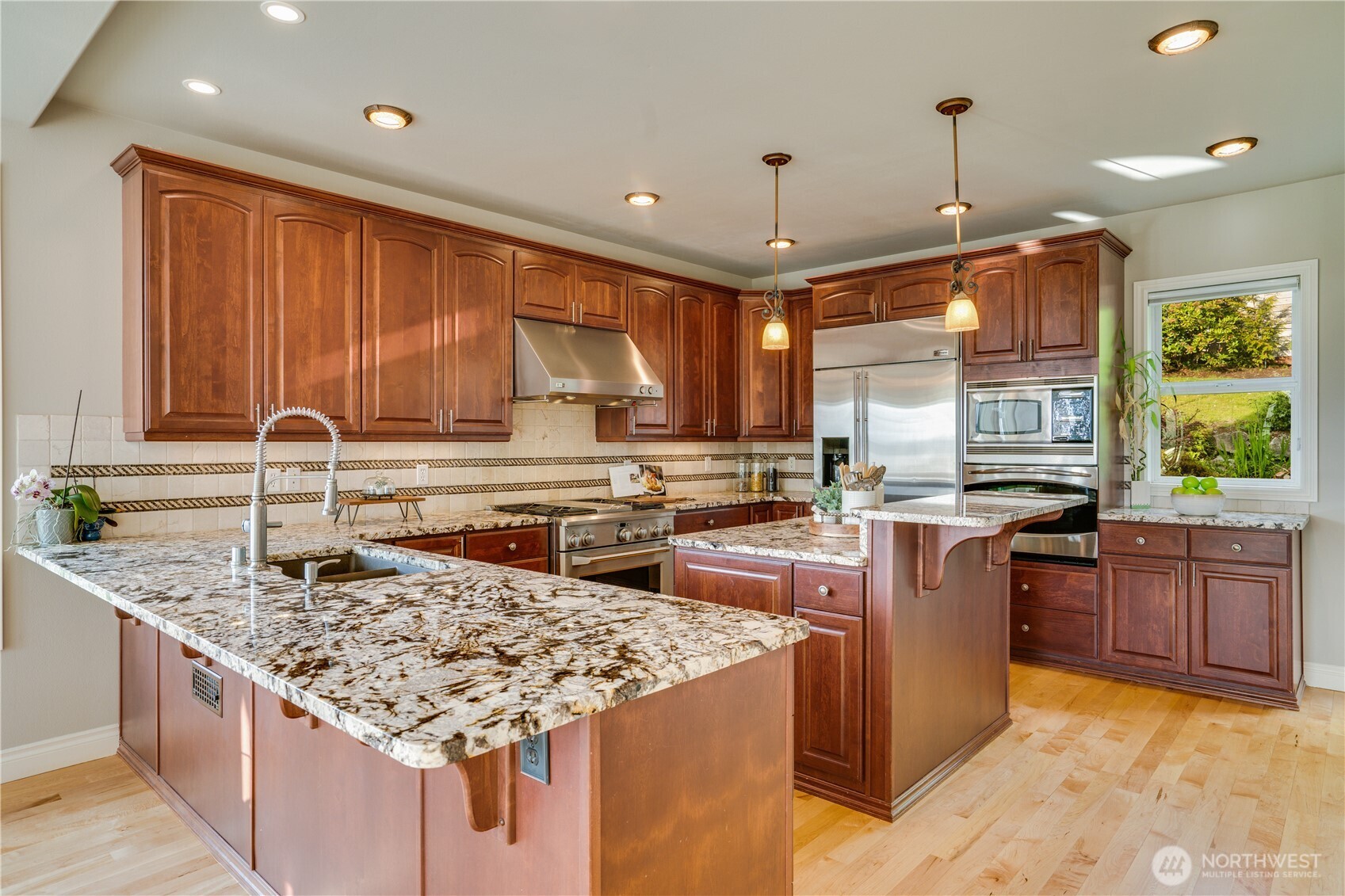Kitchen layout works great for two people in the kitchen.  Pull up a stool and watch the action from the island.