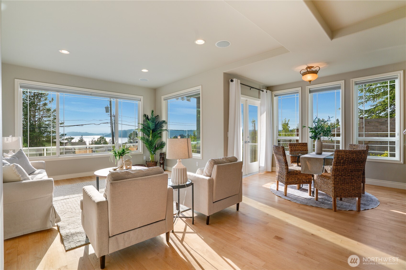 Seating & eating areas in the great room take in the views.