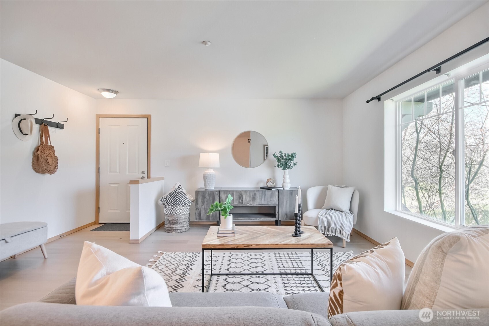 Spacious living room has Lake view